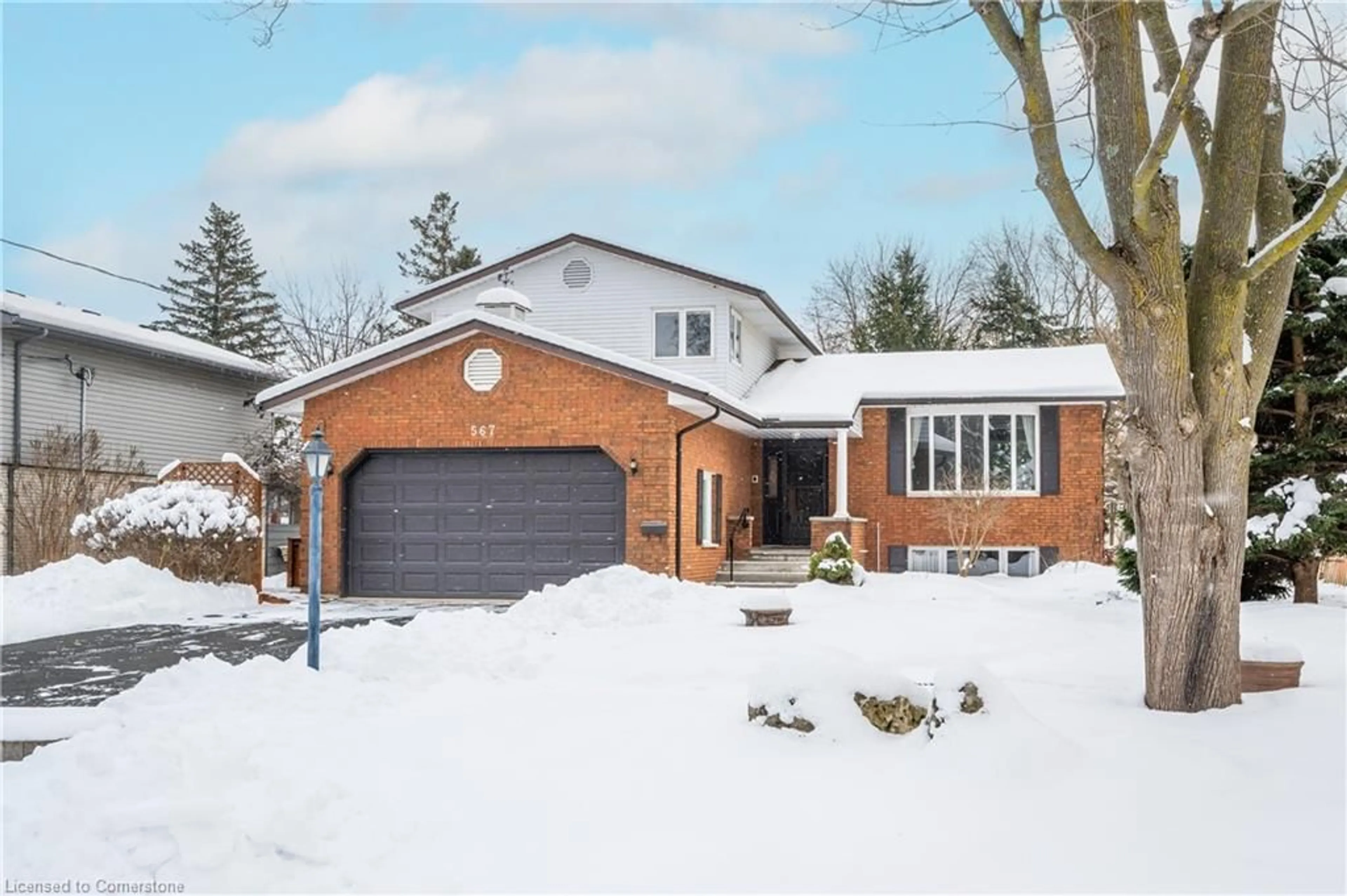 Home with brick exterior material, street for 567 Rustic Dr, Waterloo Ontario N2K 2A4