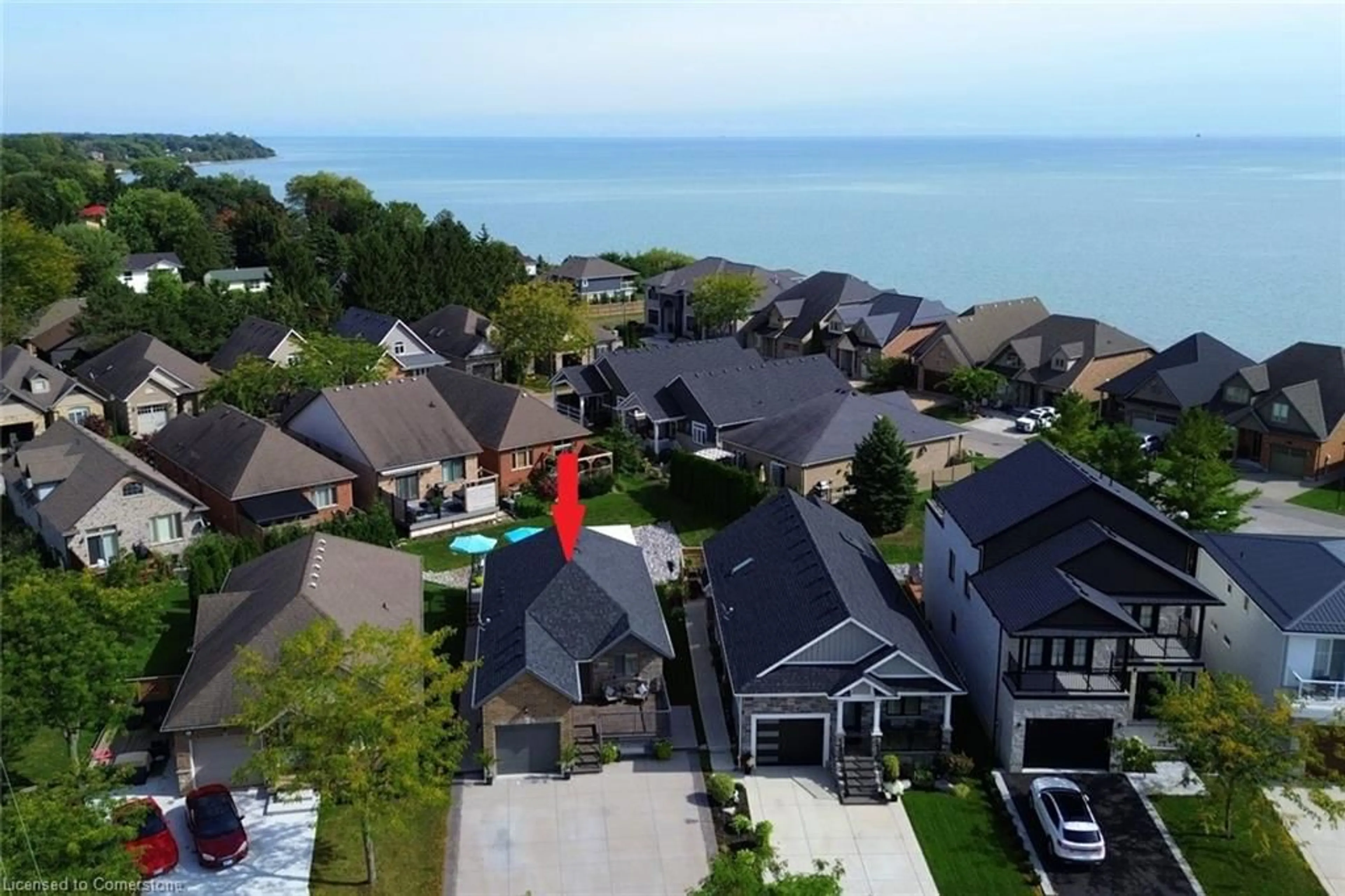 A pic from outside/outdoor area/front of a property/back of a property/a pic from drone, water/lake/river/ocean view for 80 New Lakeshore Rd #24, Port Dover Ontario N0A 1N8