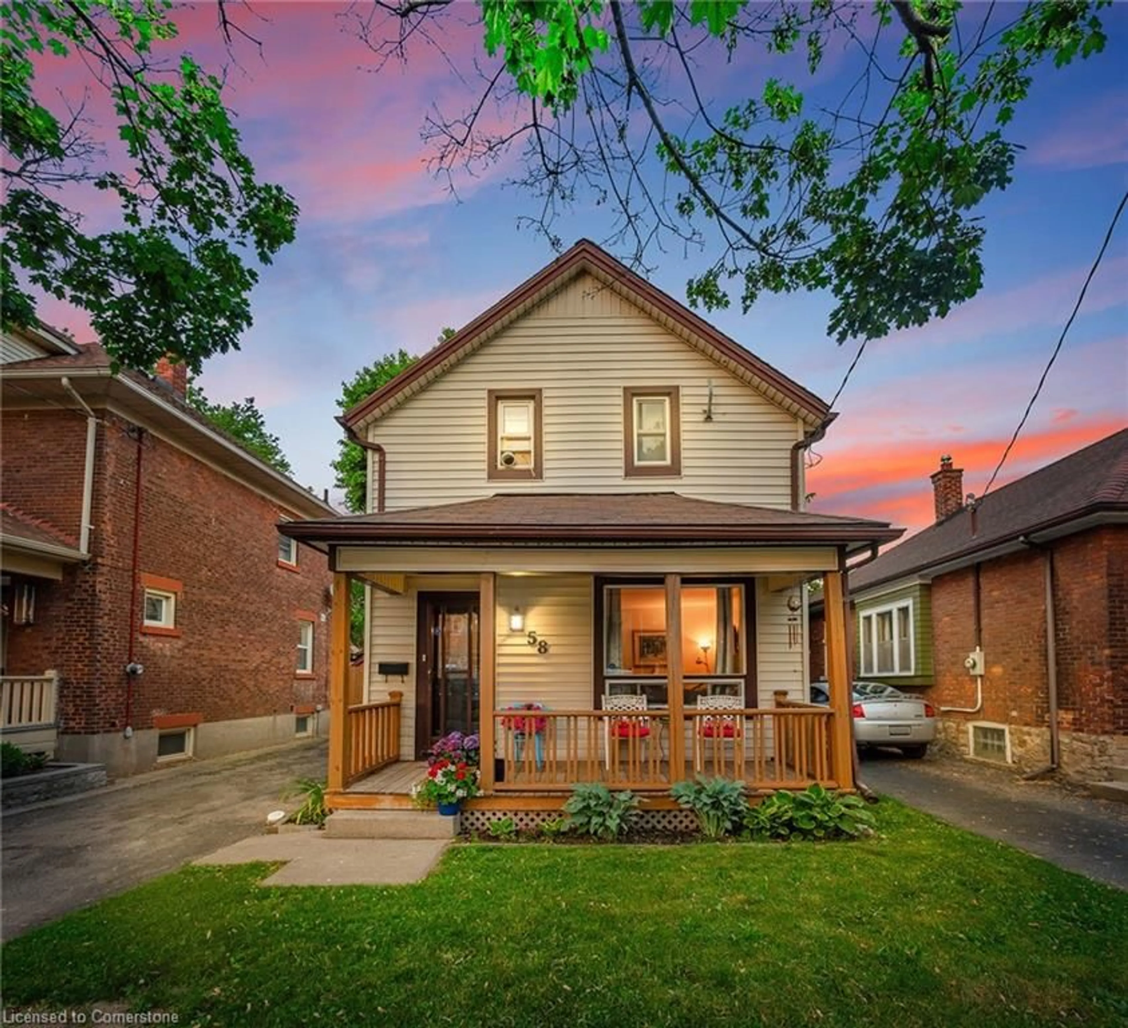 Home with brick exterior material, street for 58 Woodland Ave, St. Catharines Ontario L2R 5A3