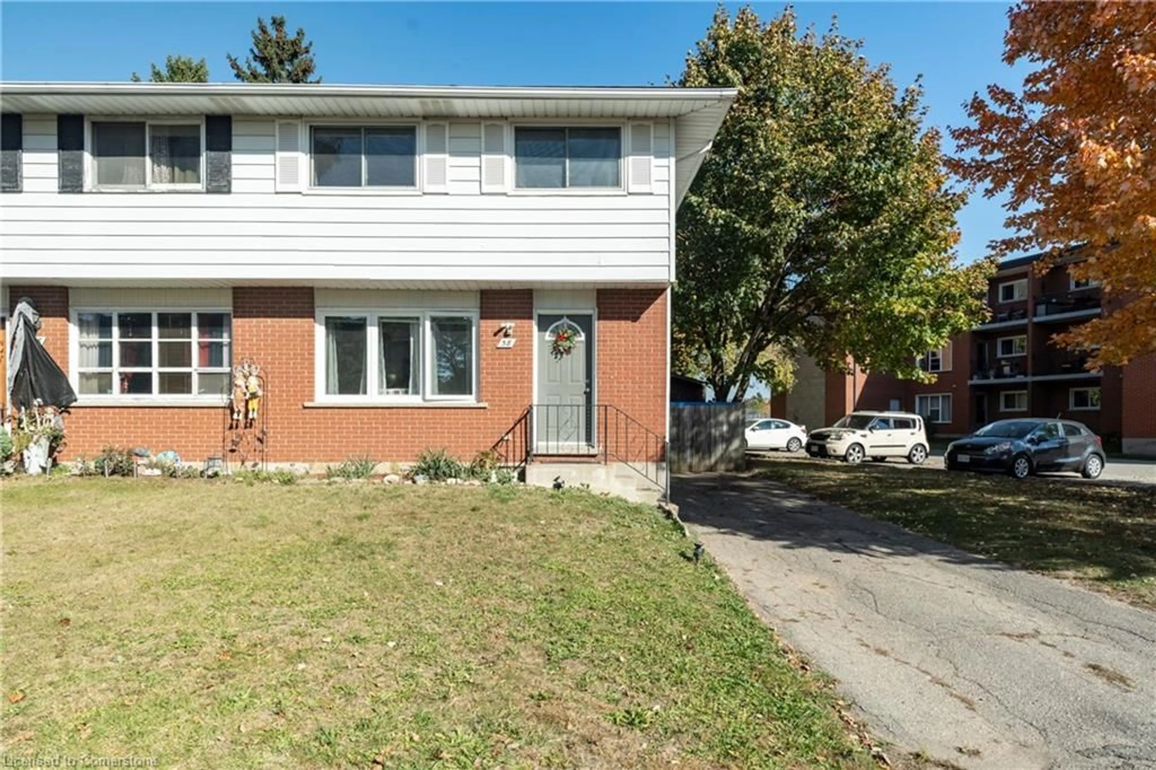 Home with brick exterior material, street for 58 Breckenridge Dr, Kitchener Ontario N2B 2N9