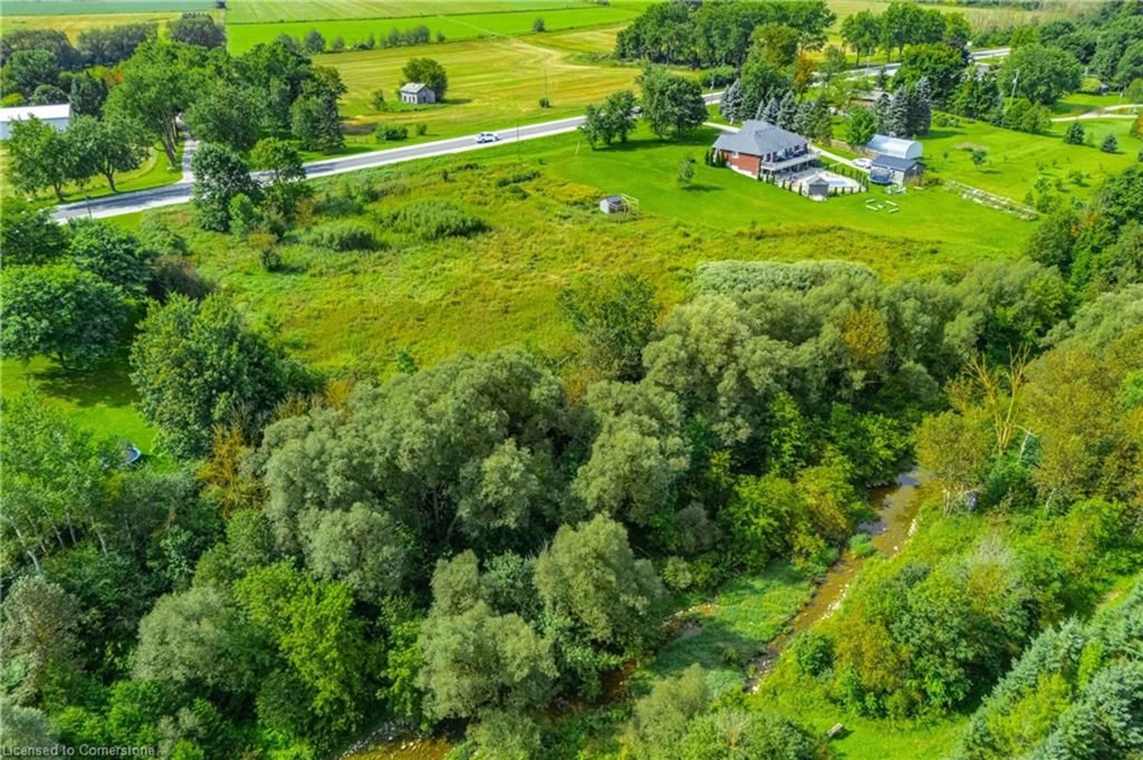 A pic from outside/outdoor area/front of a property/back of a property/a pic from drone, forest/trees view for 7916 Wellington Road 109, Arthur Ontario N0G 1A0