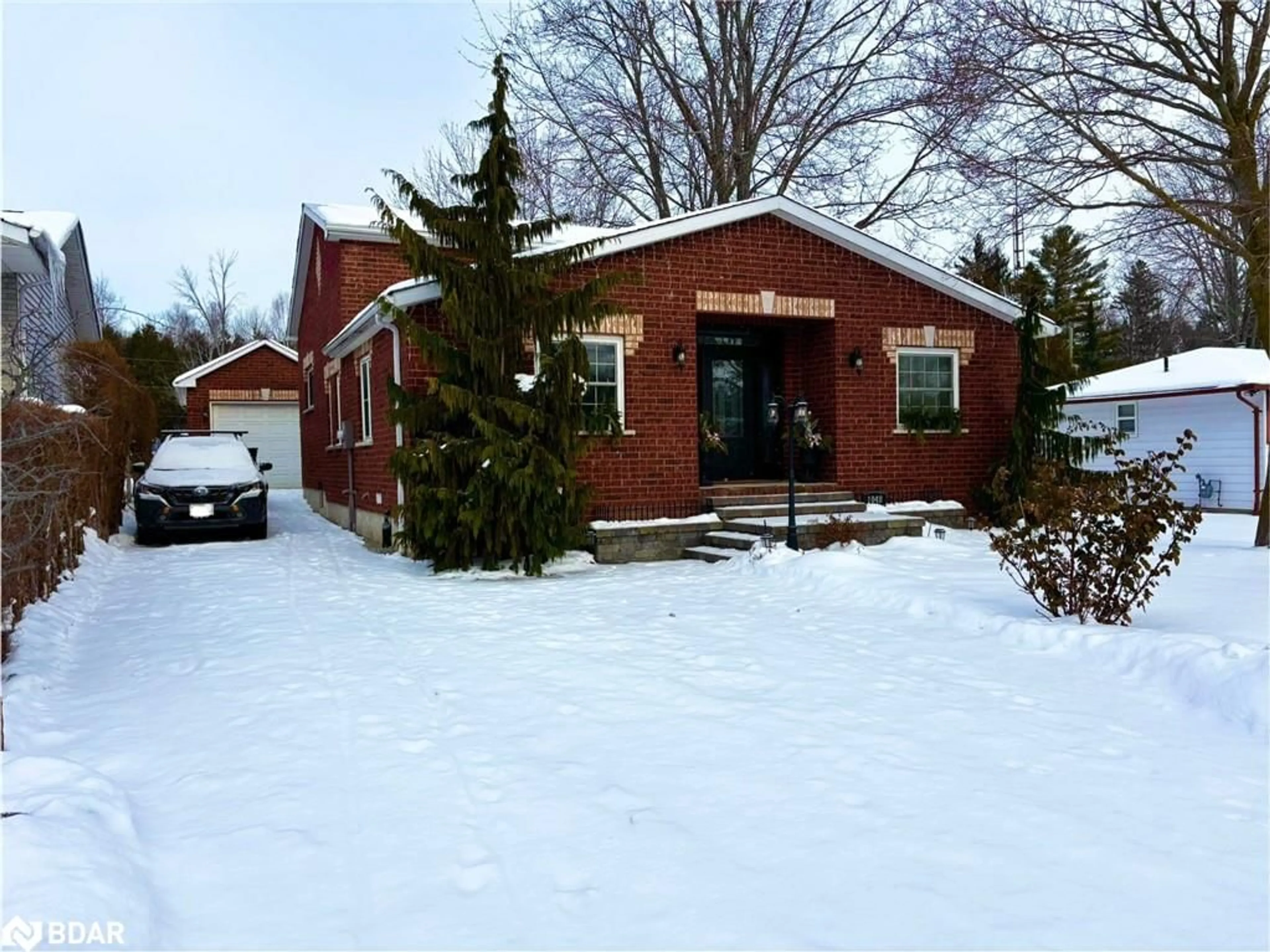 Home with brick exterior material, street for 1048 Fern Road, Innisfil Ontario L0L 1C0