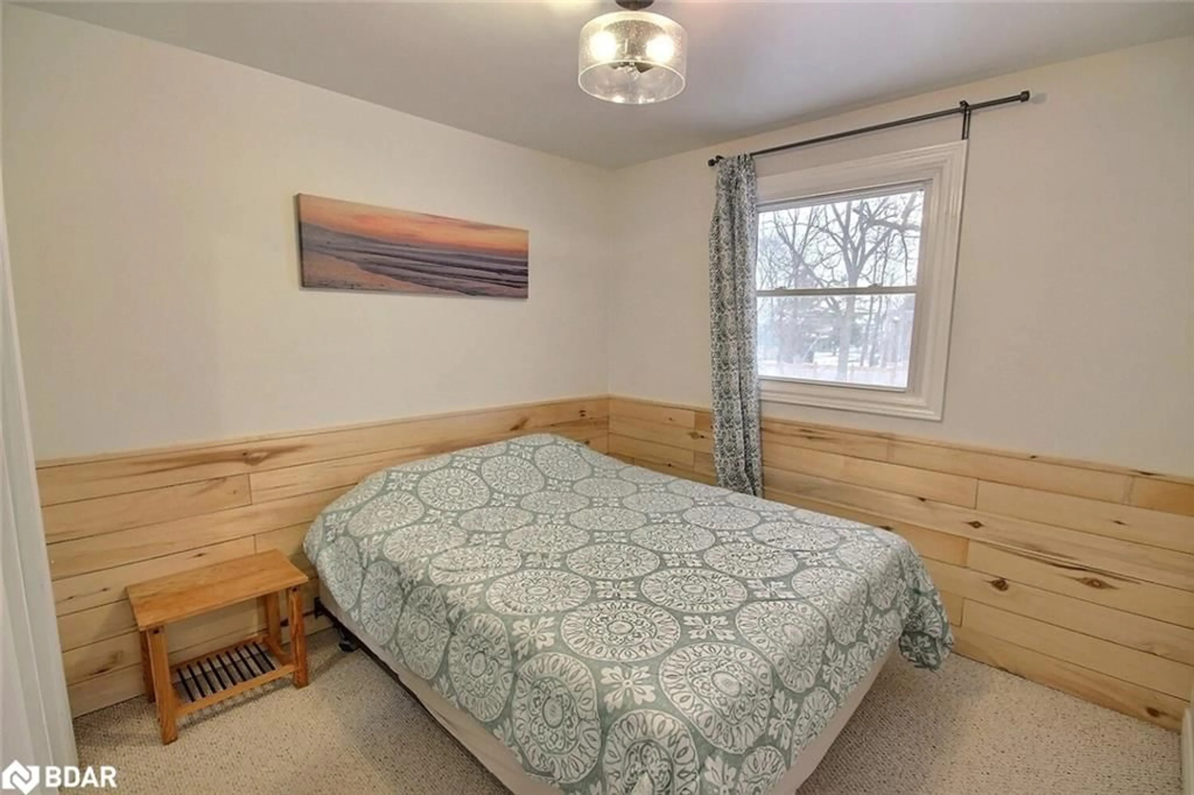 Bedroom with bed, wood/laminate floor for 1310 County Road 3, Prince Edward Ontario K0K 1L0