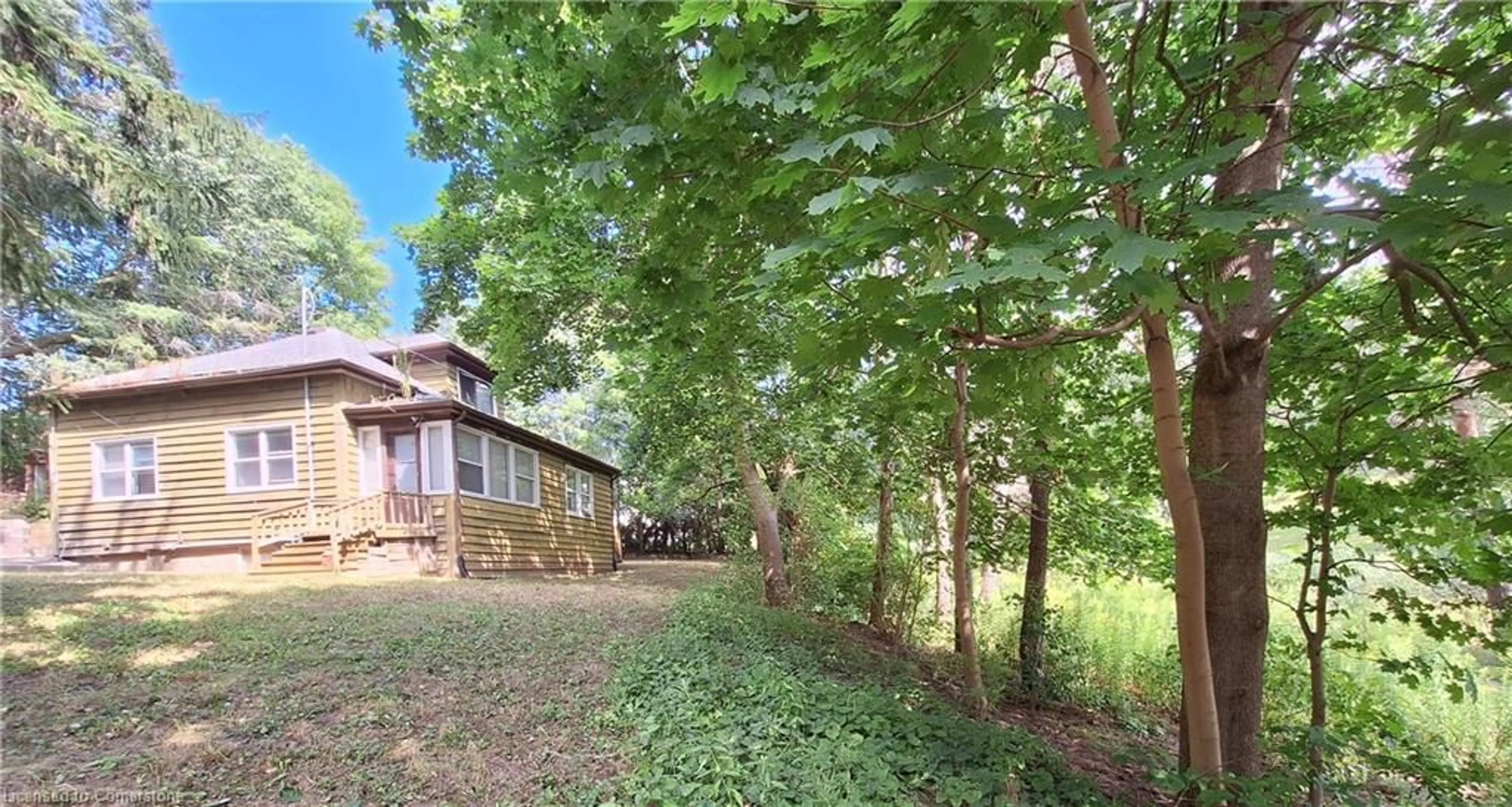 A pic from outside/outdoor area/front of a property/back of a property/a pic from drone, forest/trees view for 191 Mill St, Waterdown Ontario L0R 2H0