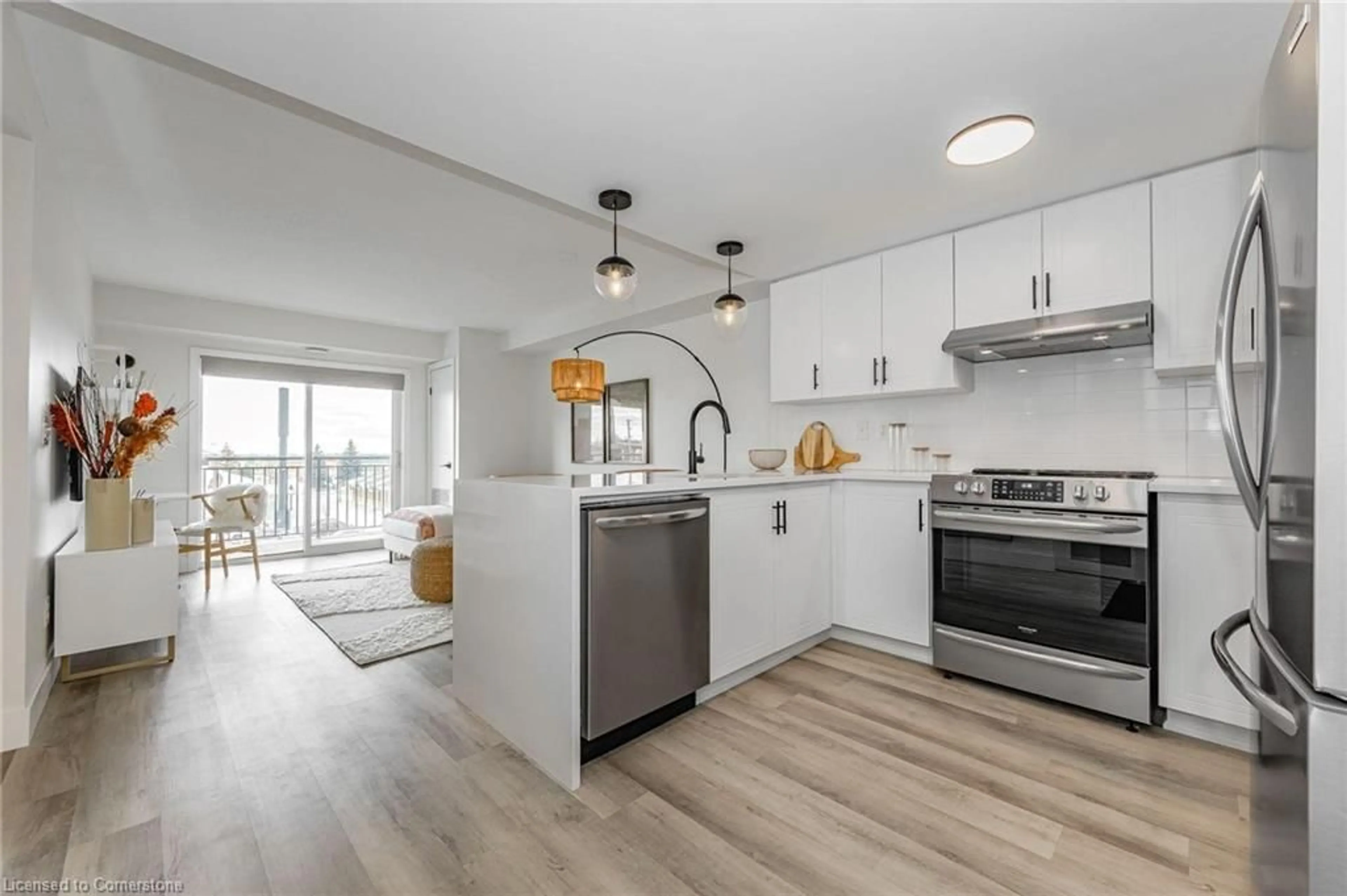 Open concept kitchen, unknown for 45 Goodwin Dr #403, Guelph Ontario N1L 0E9