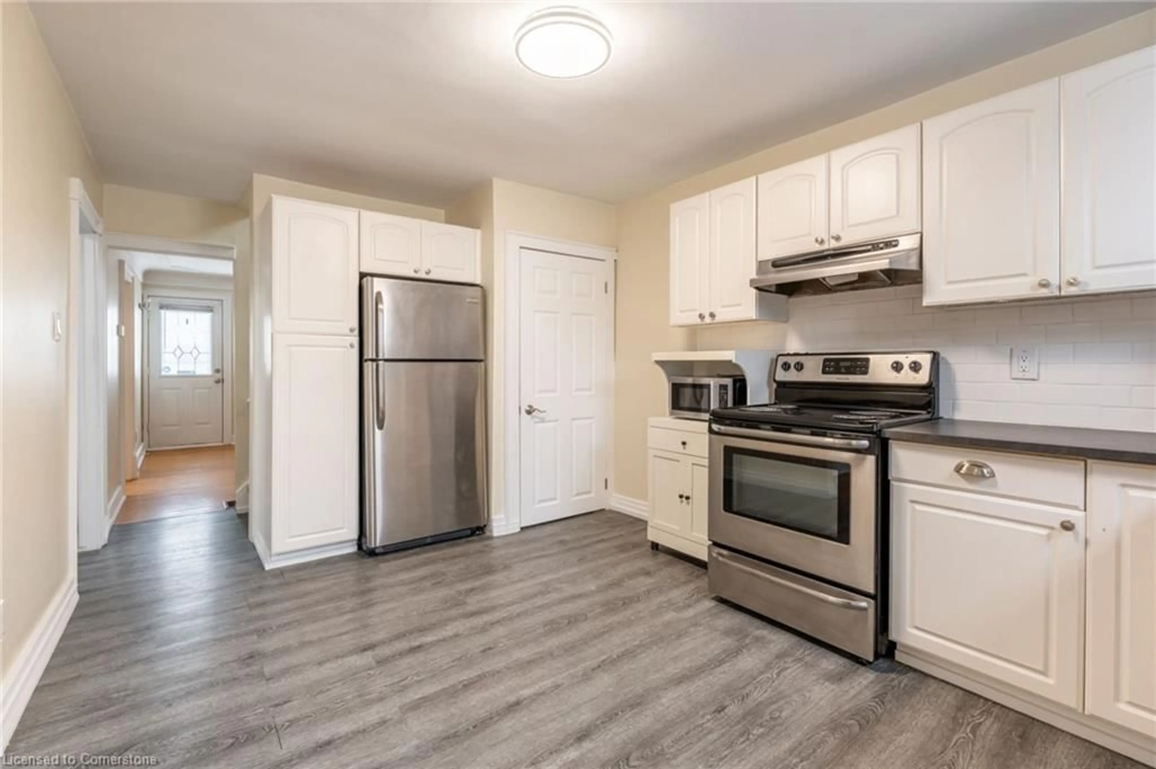 Standard kitchen, wood/laminate floor for 230 Julian Ave, Hamilton Ontario L8H 5S1