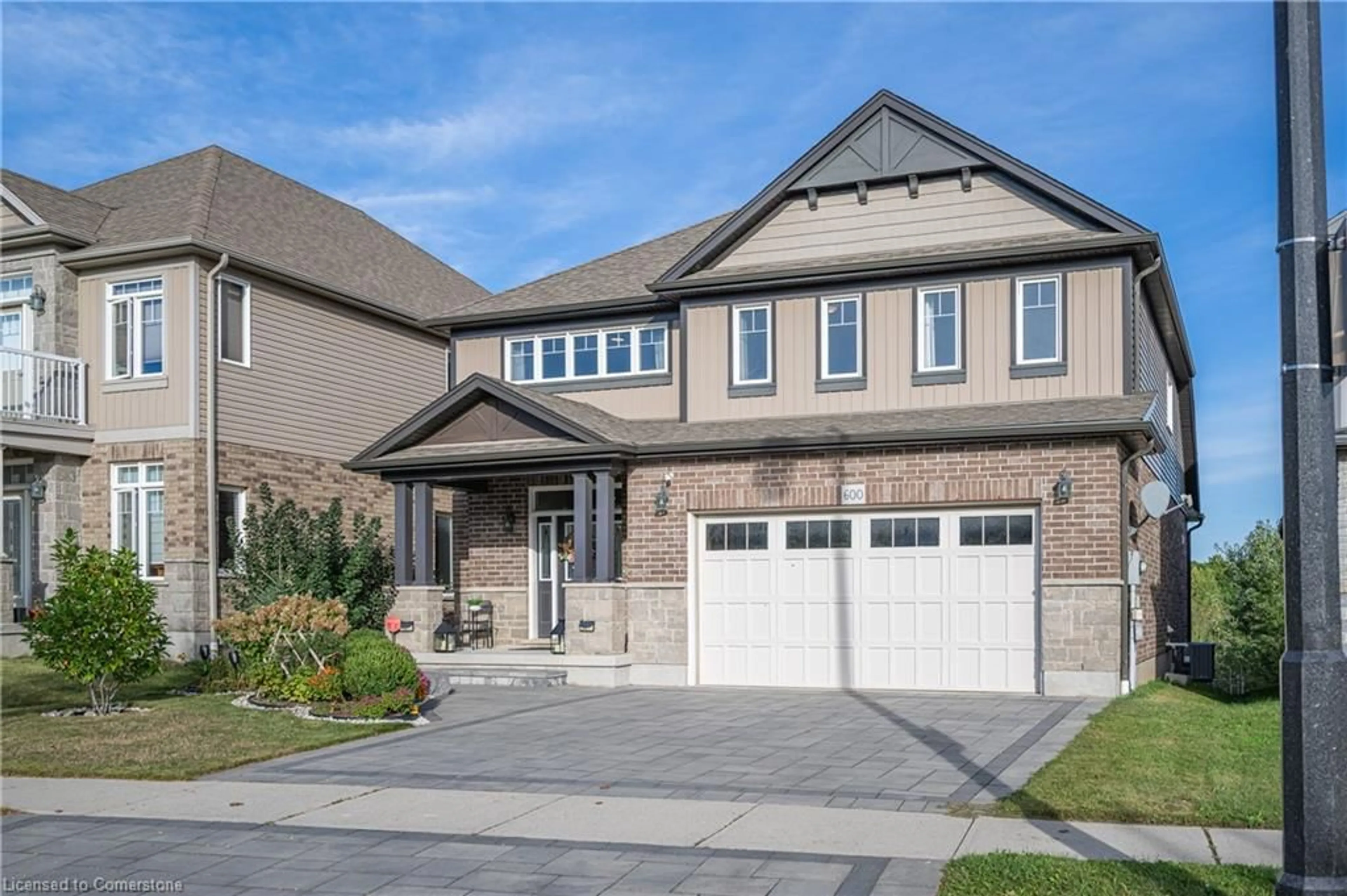 Home with brick exterior material, street for 600 Sundew Dr, Waterloo Ontario N2V 0B9