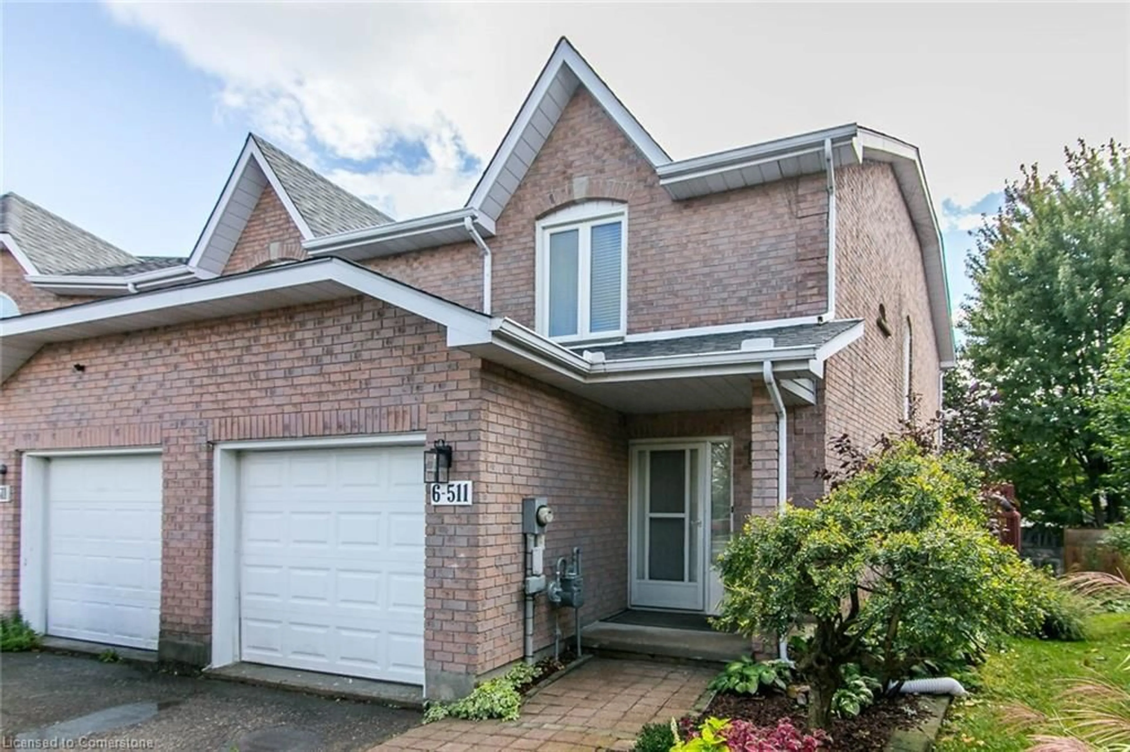 Home with brick exterior material, street for 511 Oakvale Dr, Waterloo Ontario N2T 2G6