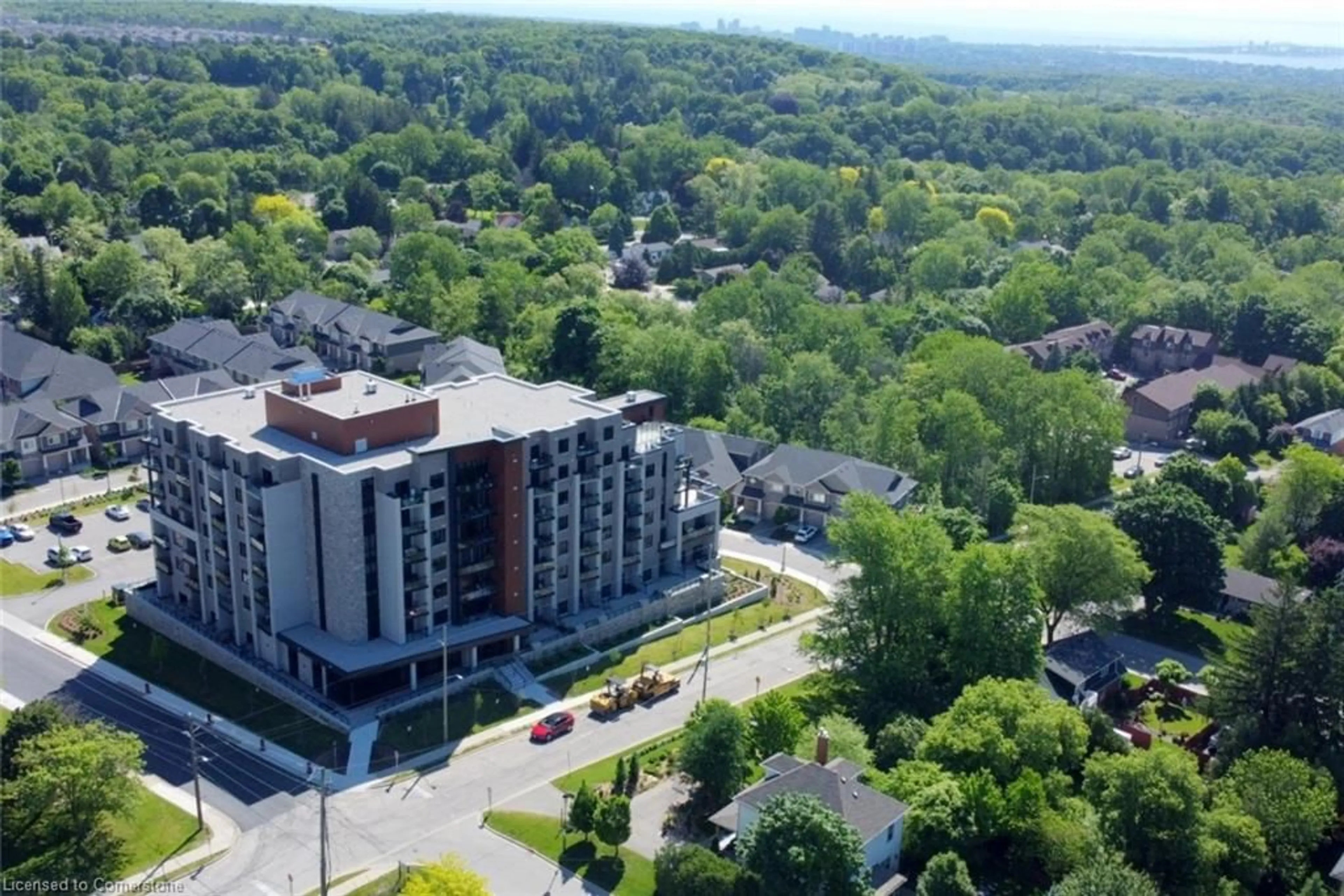 A pic from outside/outdoor area/front of a property/back of a property/a pic from drone, building for 30 Hamilton Street South St #605, Waterdown Ontario L8B 1V8