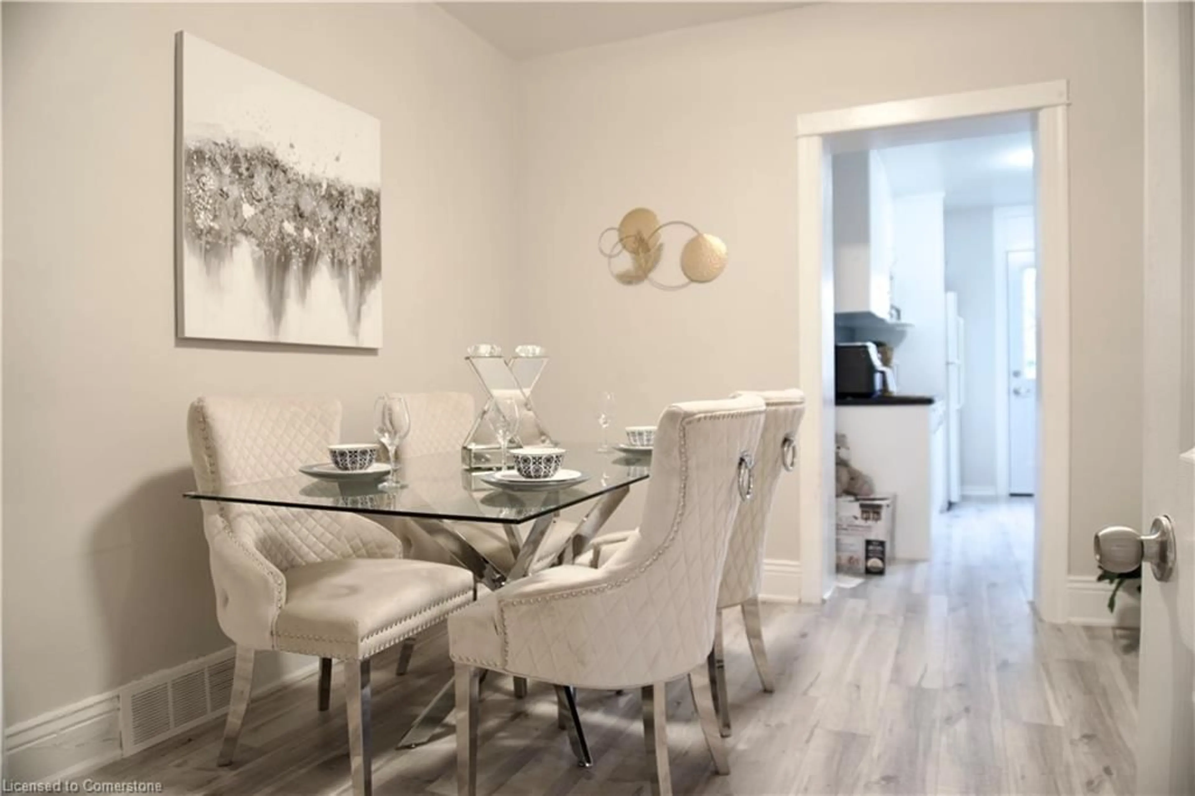 Dining room, wood/laminate floor for 7 Cluny Ave, Hamilton Ontario L8L 3H7