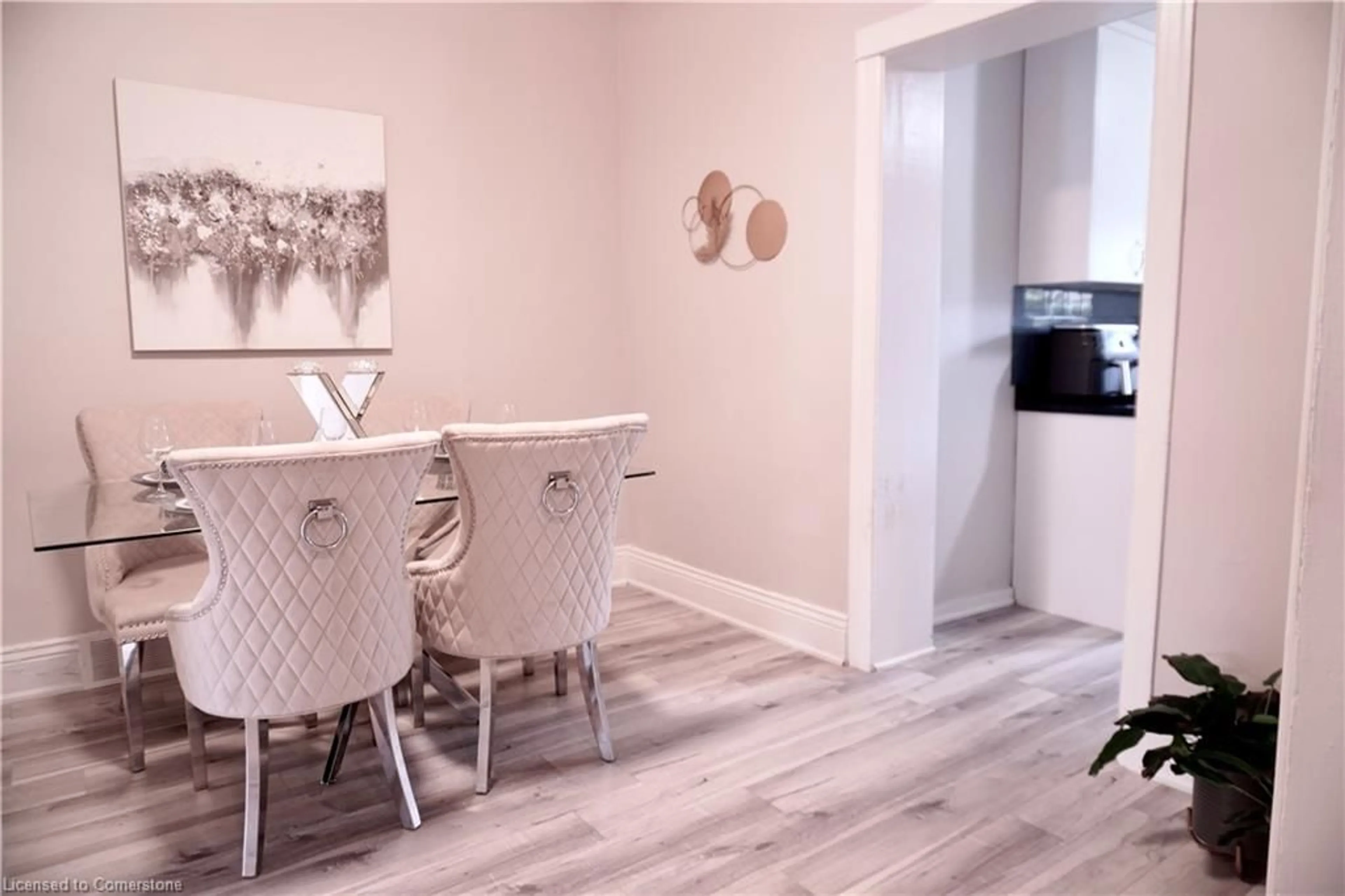 Dining room, wood/laminate floor for 7 Cluny Ave, Hamilton Ontario L8L 3H7