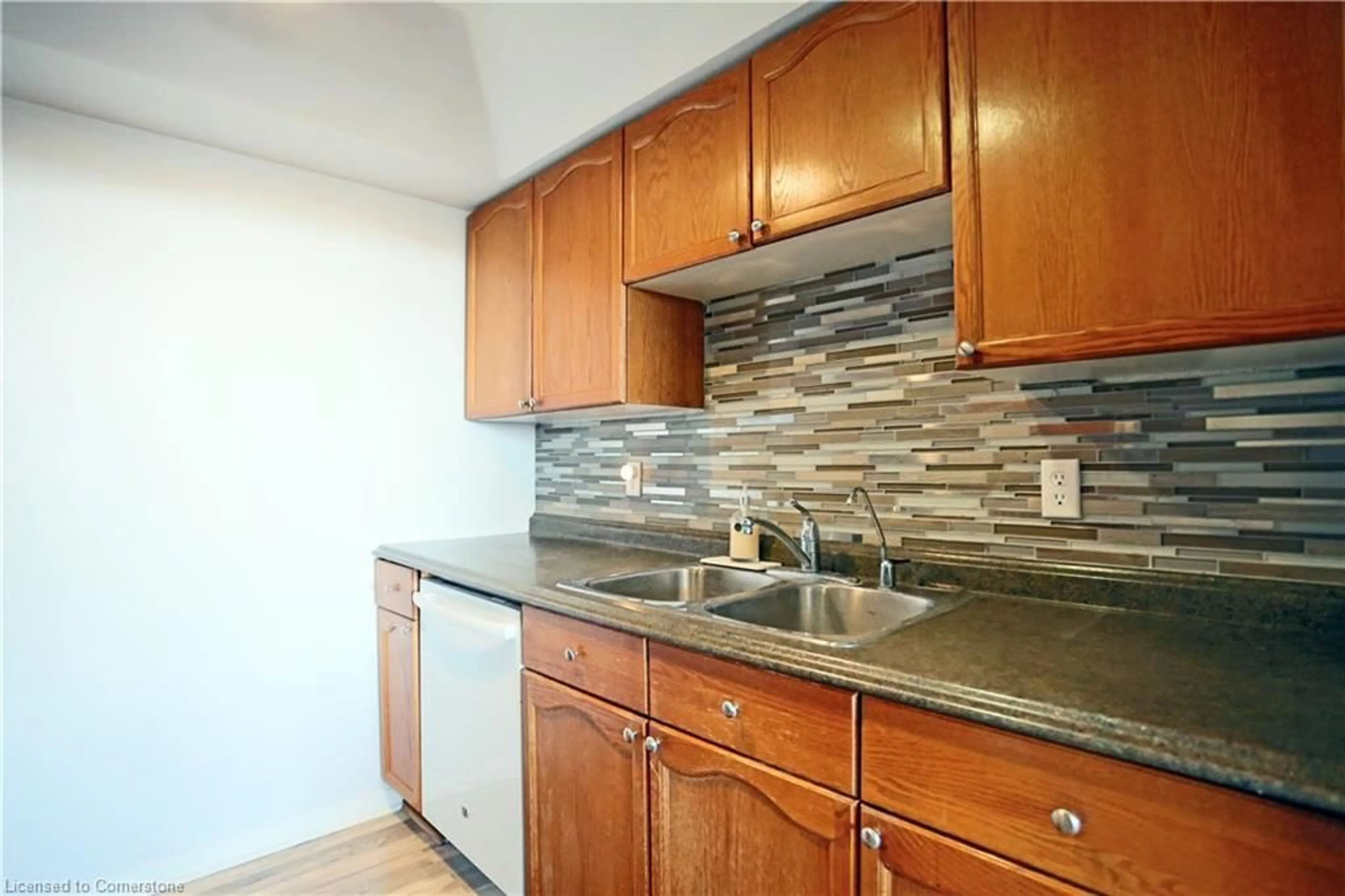 Standard kitchen, ceramic/tile floor for 107 Bagot St #605, Guelph Ontario N1H 8H5