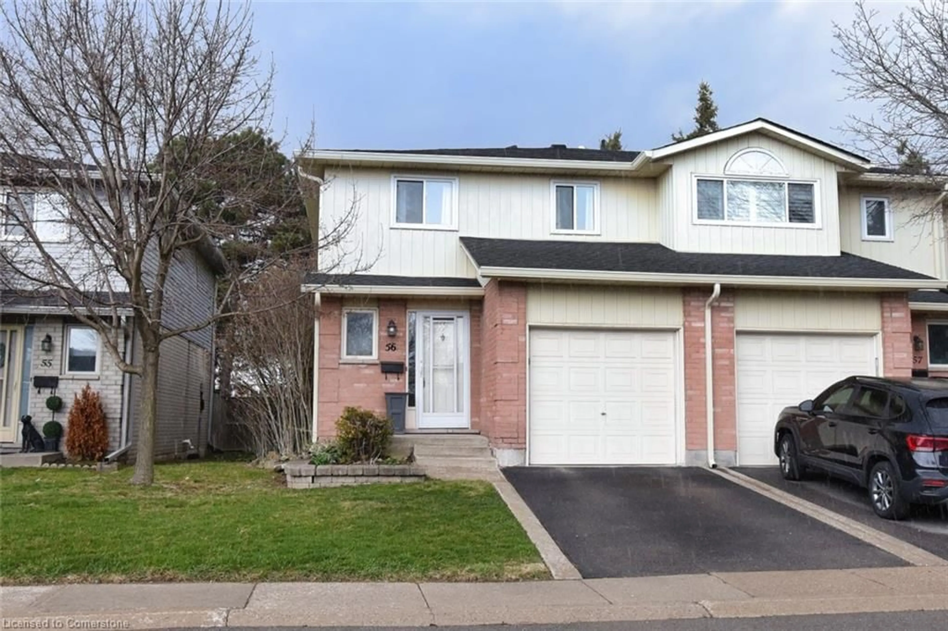 Home with vinyl exterior material, street for 1675 Upper Gage Ave #56, Hamilton Ontario L8W 3R8