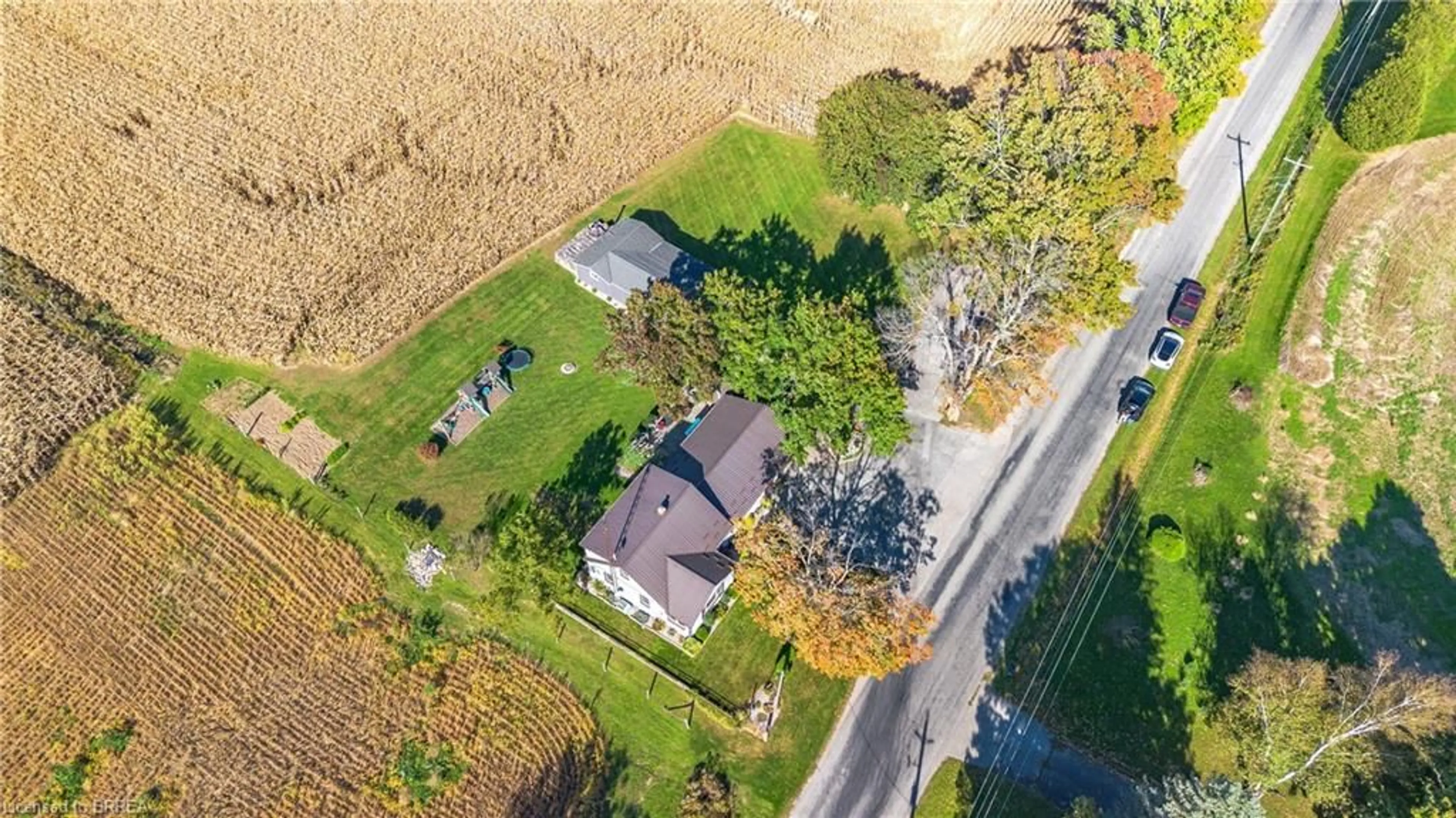 A pic from outside/outdoor area/front of a property/back of a property/a pic from drone, street for 1331 Concession 12 Rd, Langton Ontario N0E 1G0