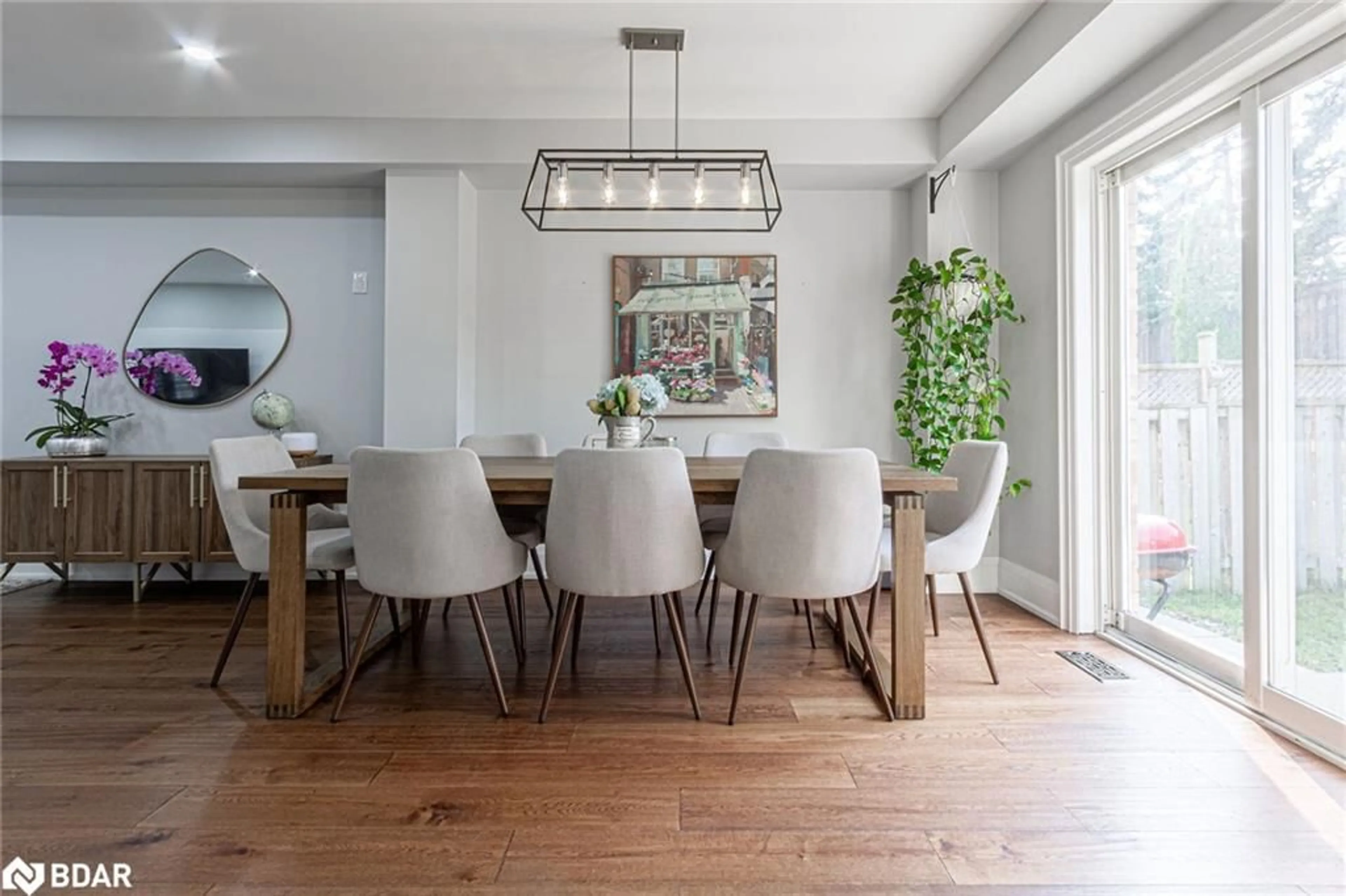 Dining room, wood/laminate floor for 28 Bramcedar Cres, Brampton Ontario L7A 1T1