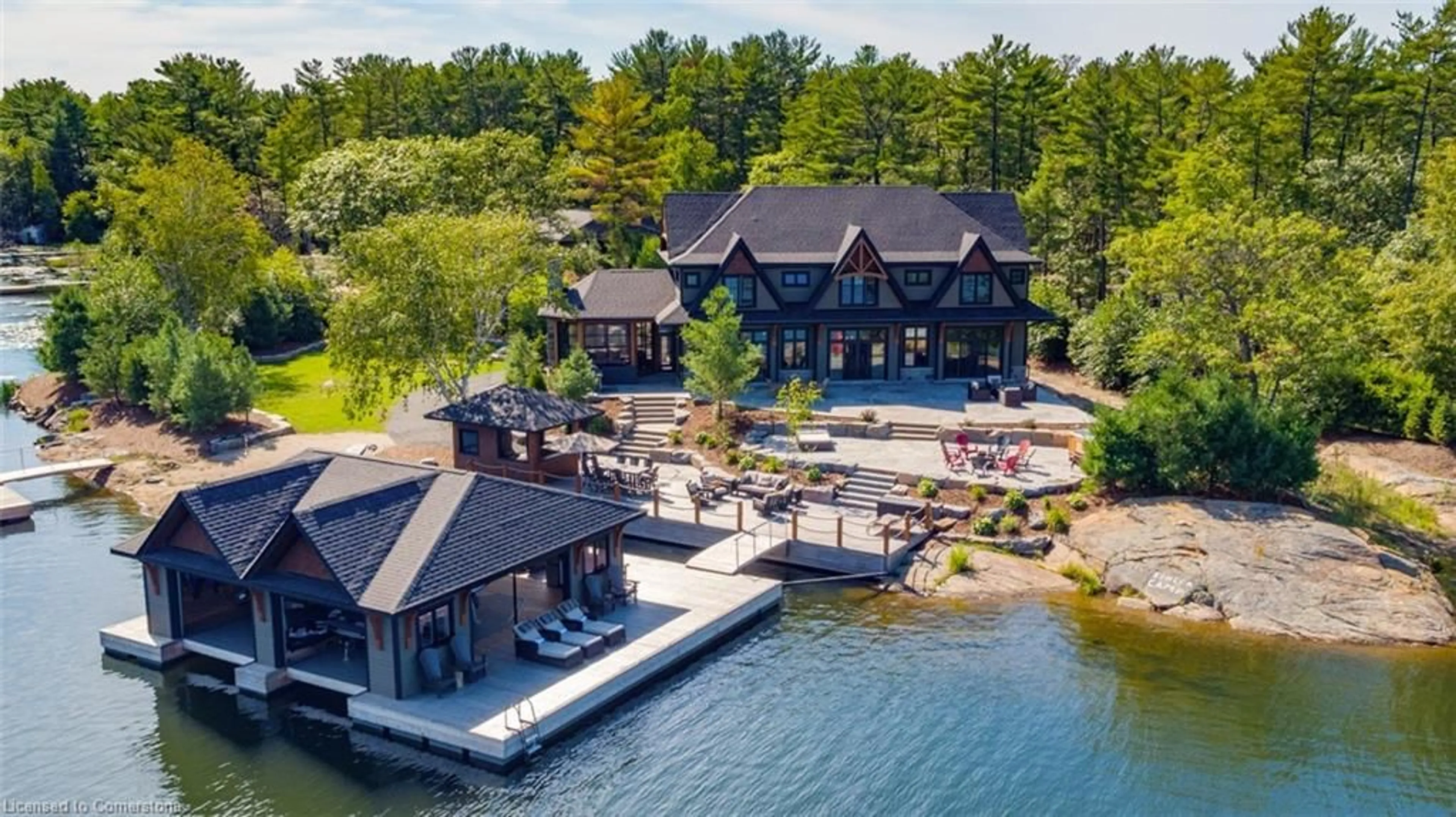 A pic from outside/outdoor area/front of a property/back of a property/a pic from drone, water/lake/river/ocean view for 250 South Shore Rd, Pointe au Baril Ontario P0G 1K0