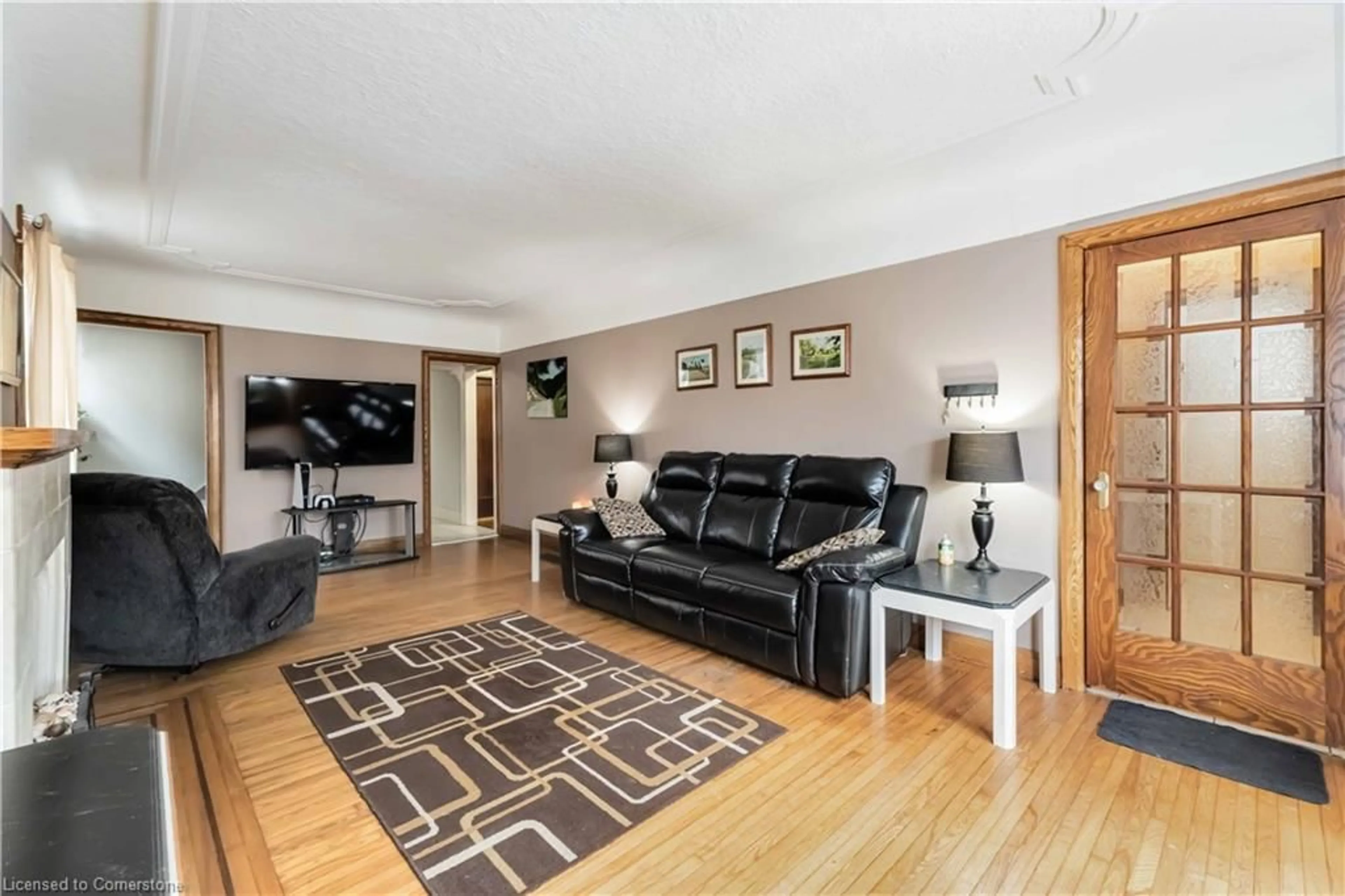 Living room with furniture, wood/laminate floor for 14 Huxley Ave, Hamilton Ontario L8K 2P6