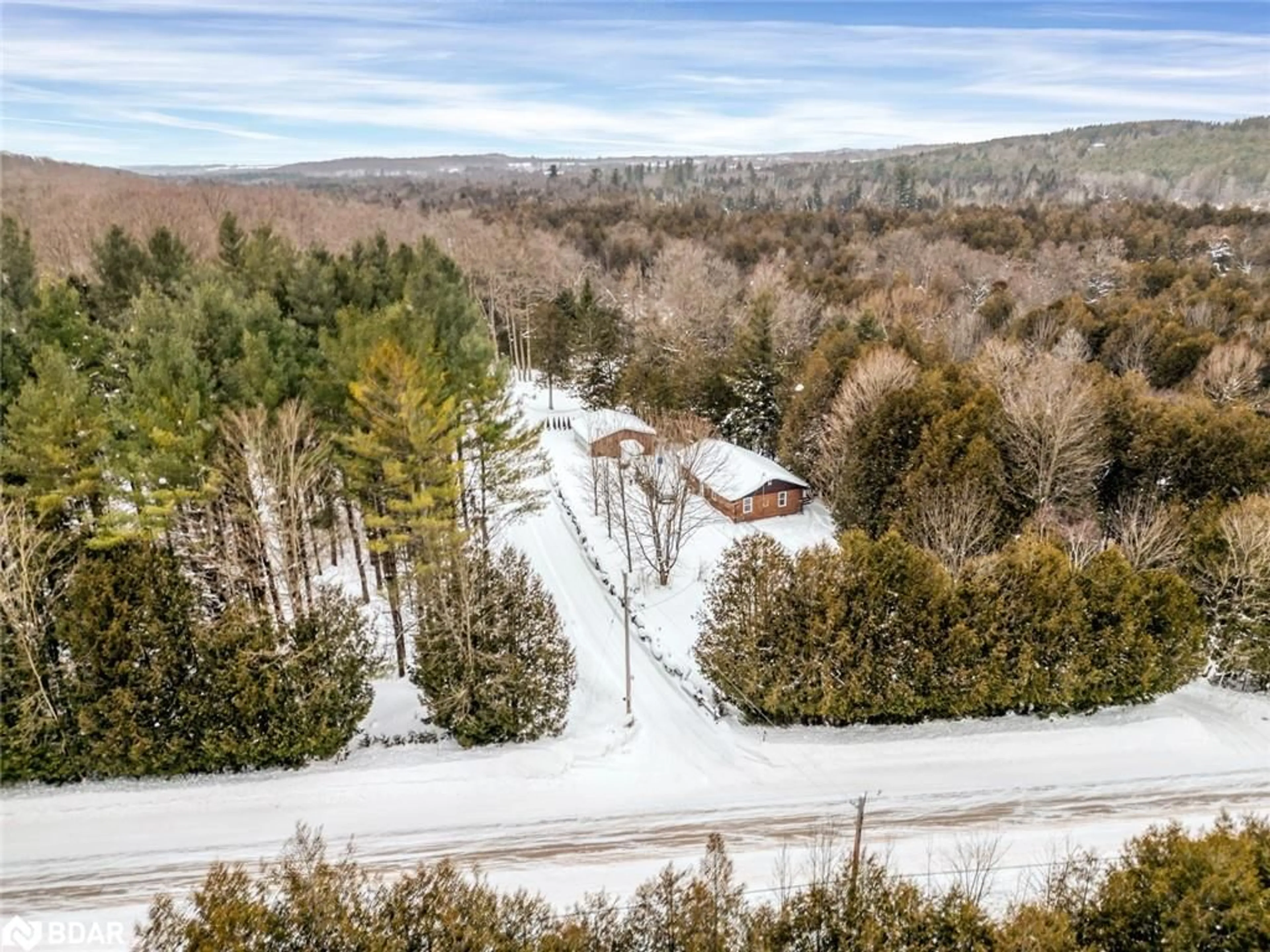 A pic from outside/outdoor area/front of a property/back of a property/a pic from drone, forest/trees view for 493824 Baptist Church Road, Priceville Ontario N0C 1K0