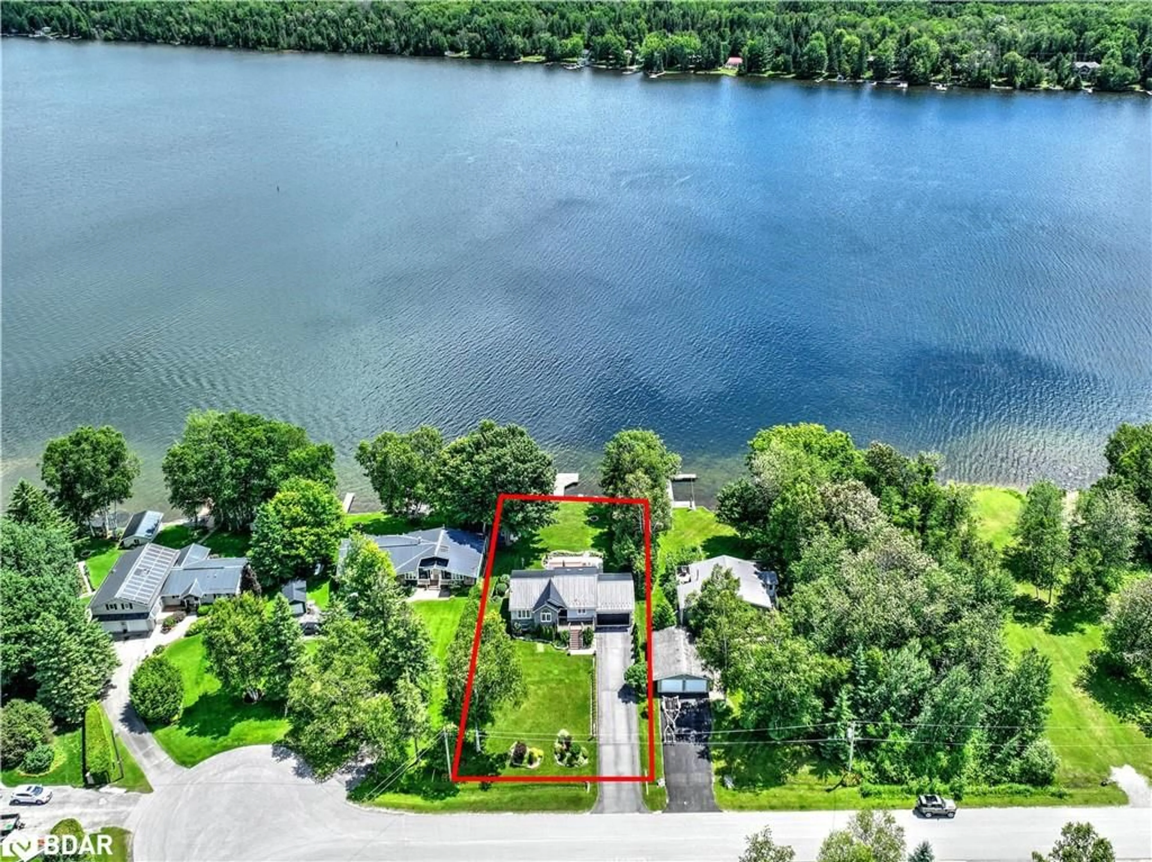 A pic from outside/outdoor area/front of a property/back of a property/a pic from drone, water/lake/river/ocean view for 26 Greenwood Cres, Woodville Ontario K0M 1T0