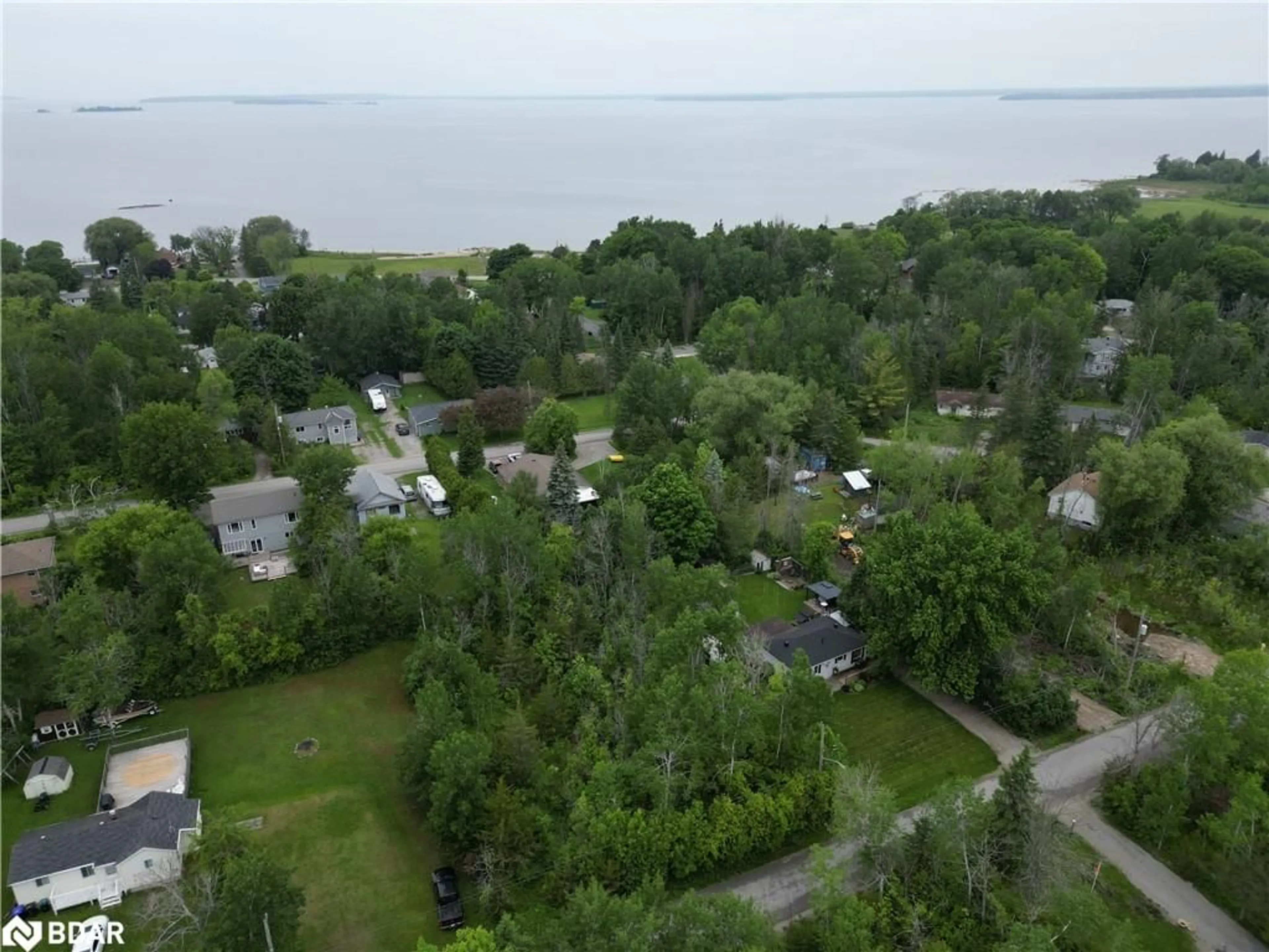 A pic from outside/outdoor area/front of a property/back of a property/a pic from drone, water/lake/river/ocean view for 256 Dignard Ave, Port McNicoll Ontario L0K 1R0