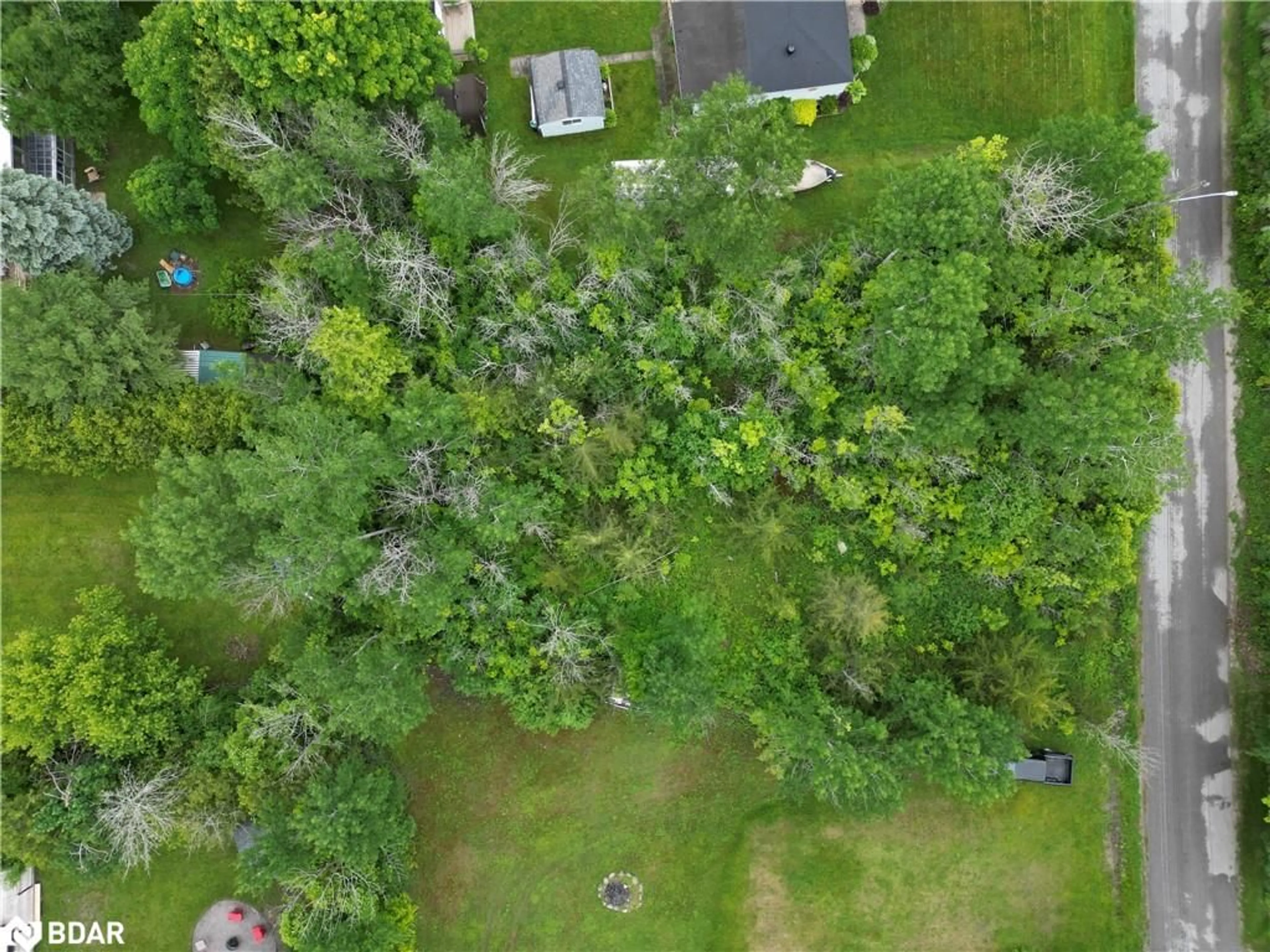 A pic from outside/outdoor area/front of a property/back of a property/a pic from drone, forest/trees view for 256 Dignard Ave, Port McNicoll Ontario L0K 1R0