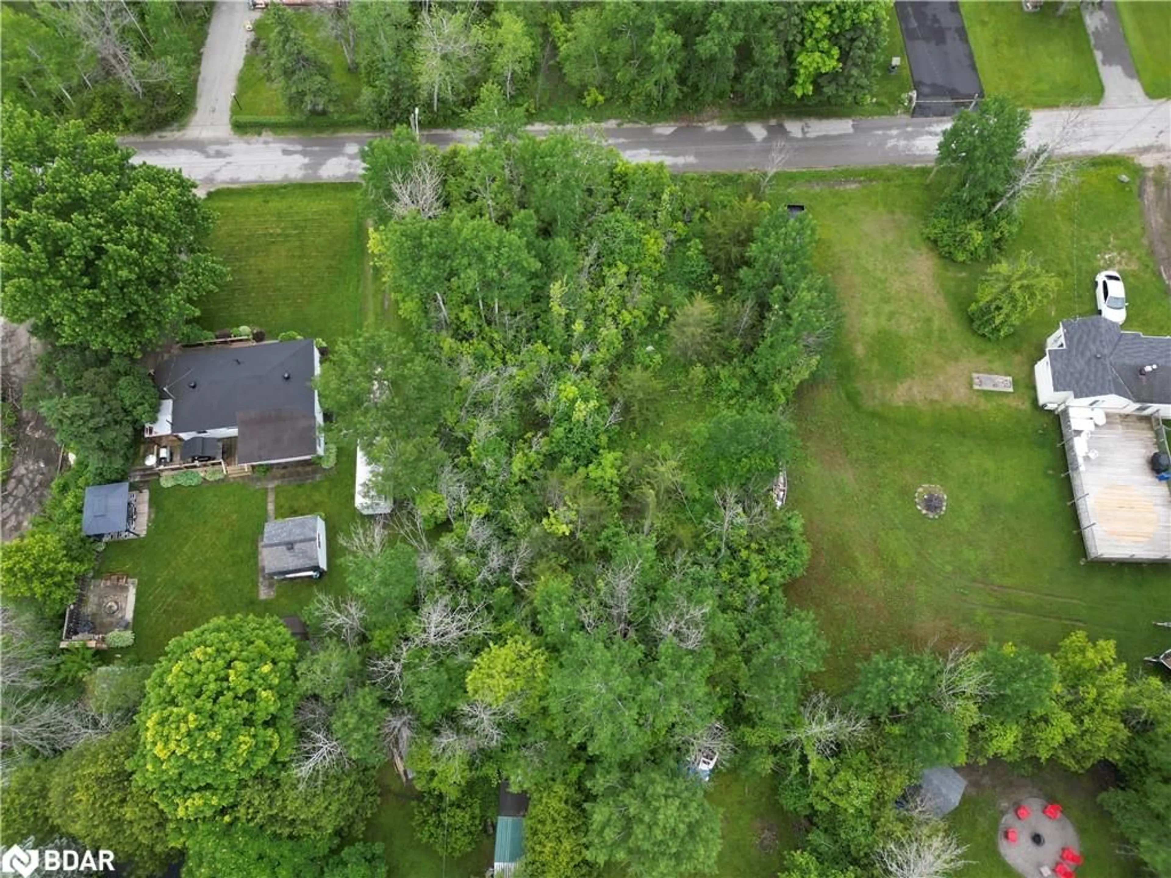 A pic from outside/outdoor area/front of a property/back of a property/a pic from drone, forest/trees view for 256 Dignard Ave, Port McNicoll Ontario L0K 1R0