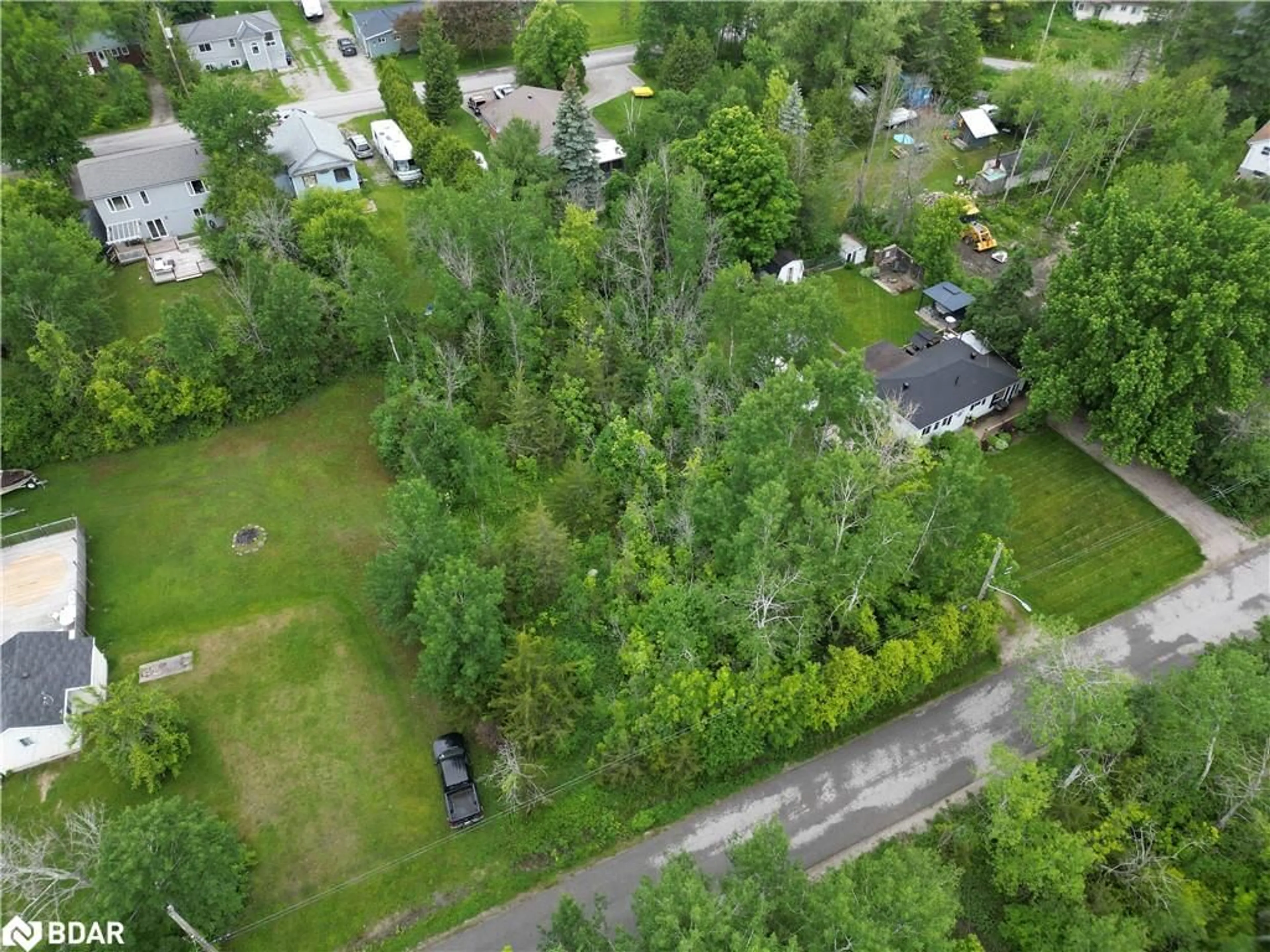 A pic from outside/outdoor area/front of a property/back of a property/a pic from drone, forest/trees view for 256 Dignard Ave, Port McNicoll Ontario L0K 1R0