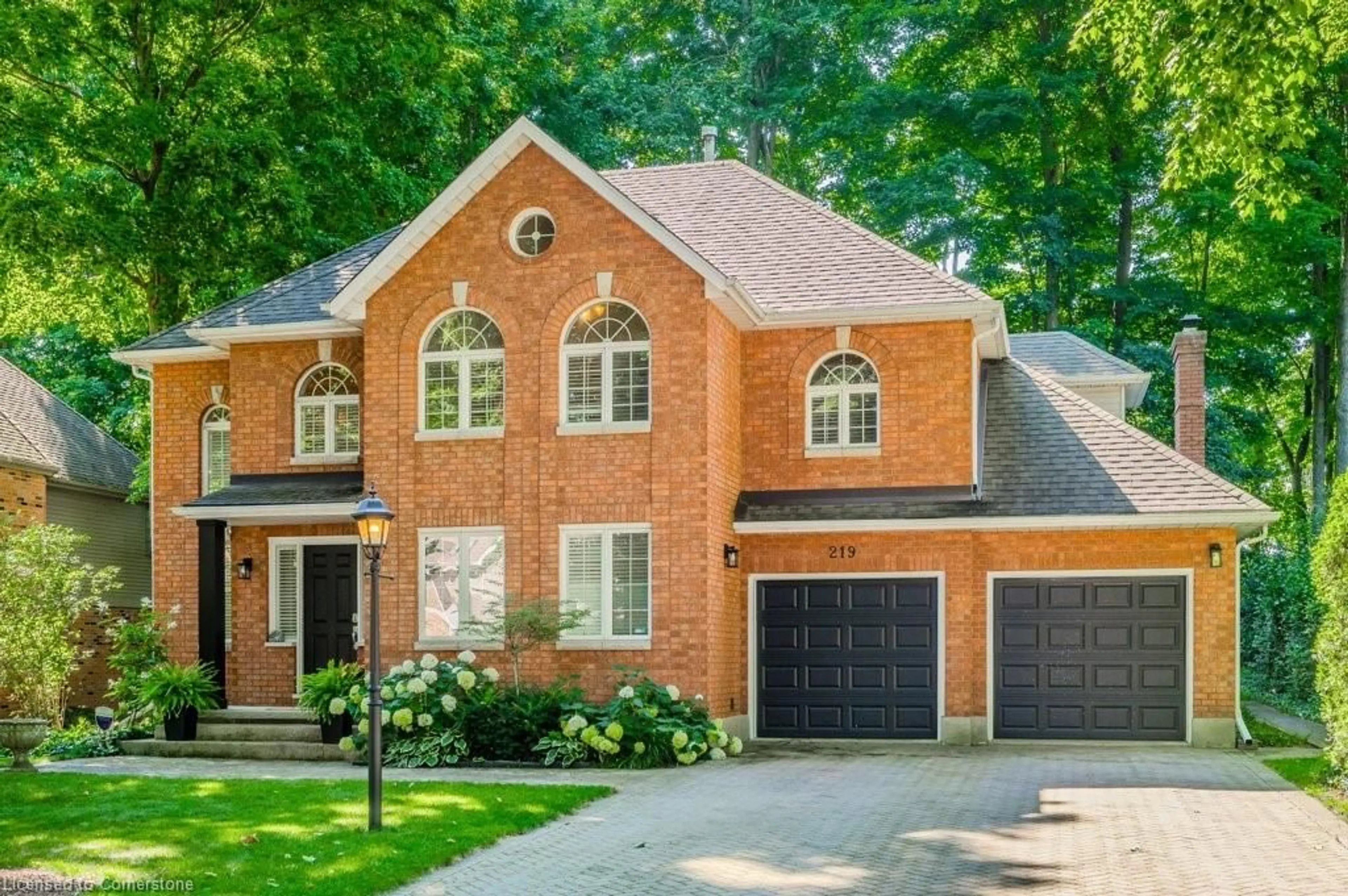 Home with brick exterior material, street for 219 Corrie Cres, Waterloo Ontario N2L 5W3