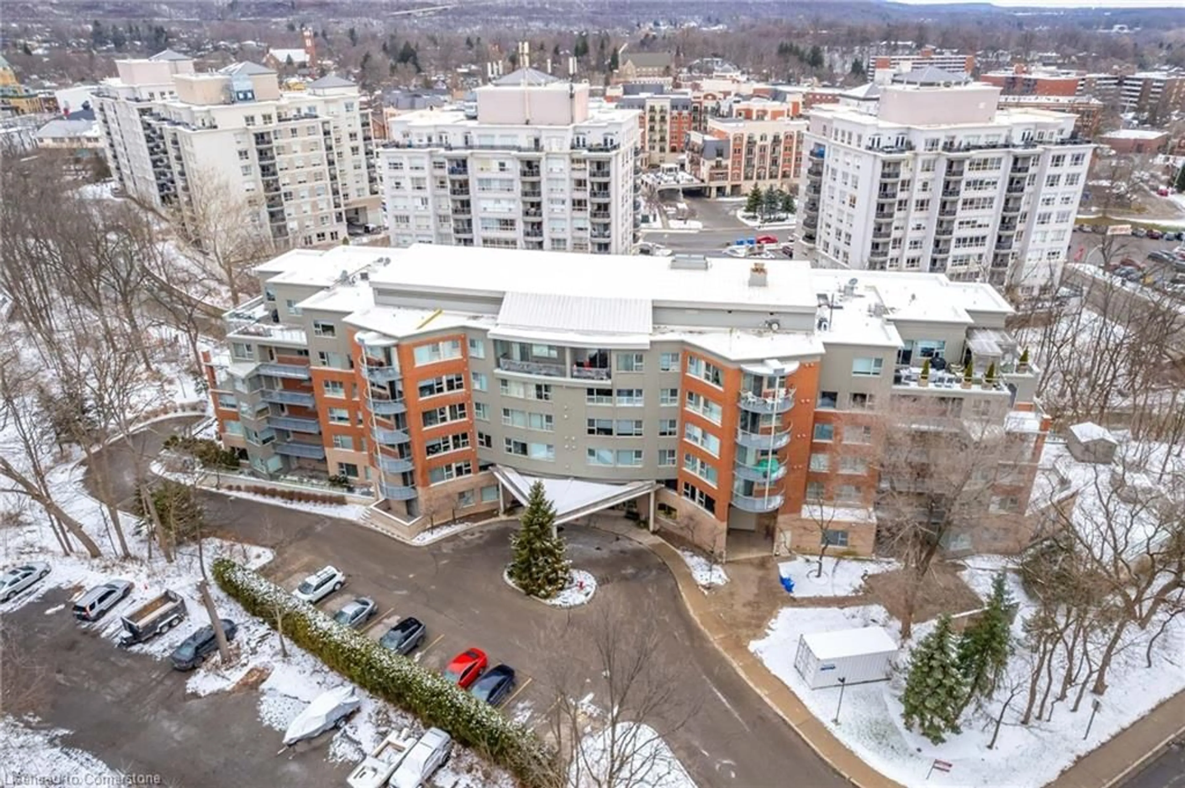 A pic from outside/outdoor area/front of a property/back of a property/a pic from drone, city buildings view from balcony for 77 Governors Rd #201, Dundas Ontario L9H 7N8