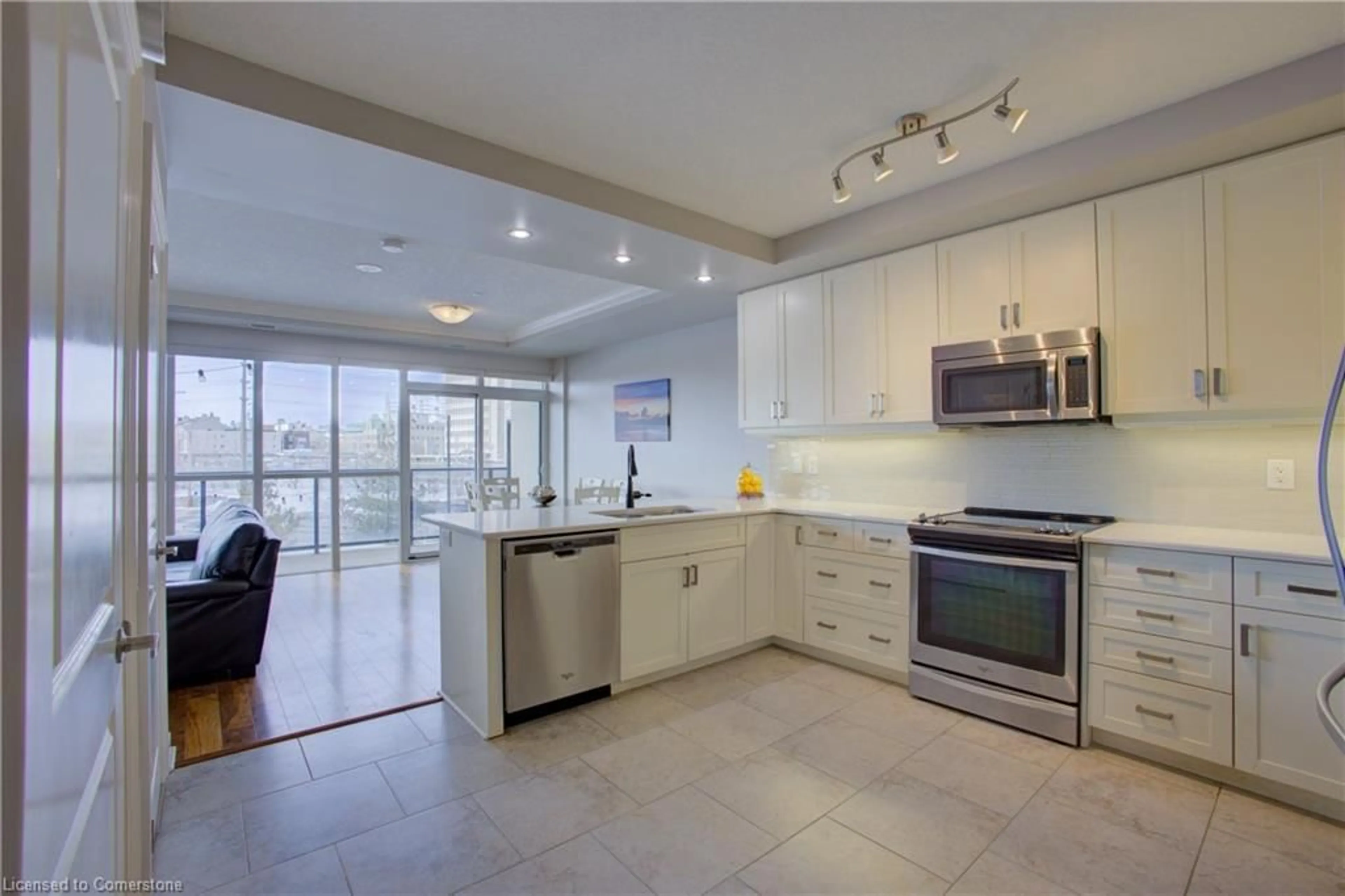 Open concept kitchen, ceramic/tile floor for 150 Wellington St #404, Guelph Ontario N1H 3R2