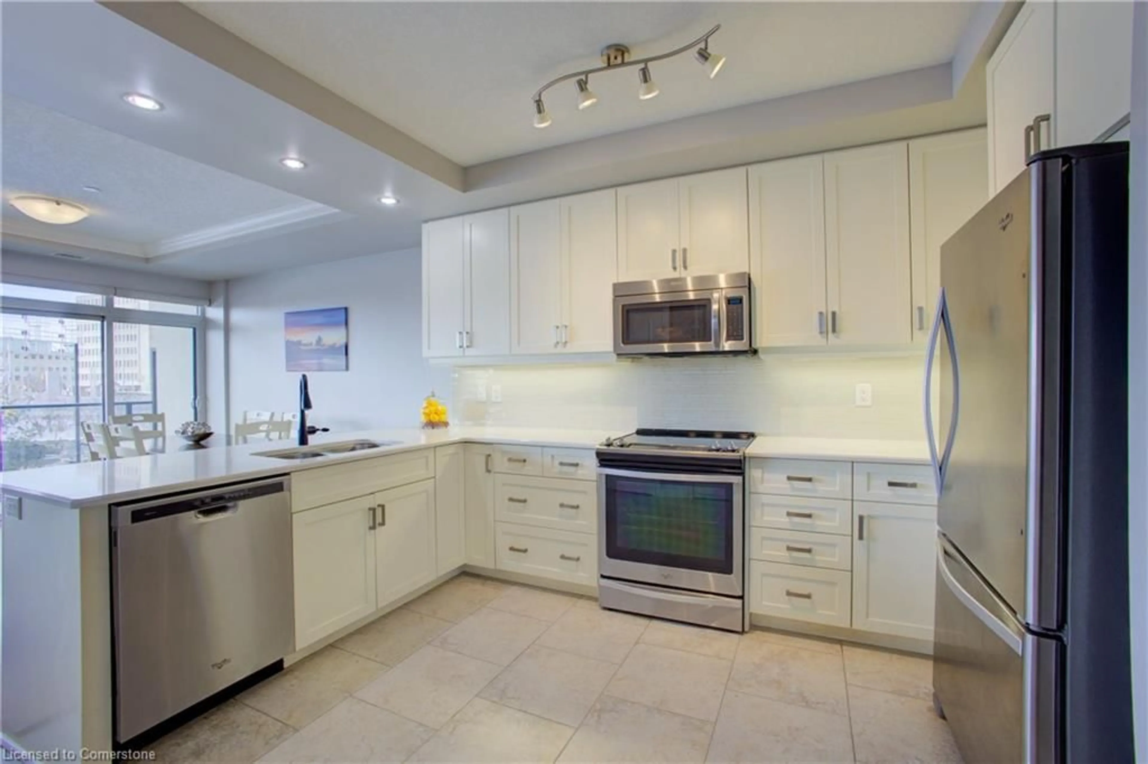 Open concept kitchen, ceramic/tile floor for 150 Wellington St #404, Guelph Ontario N1H 3R2