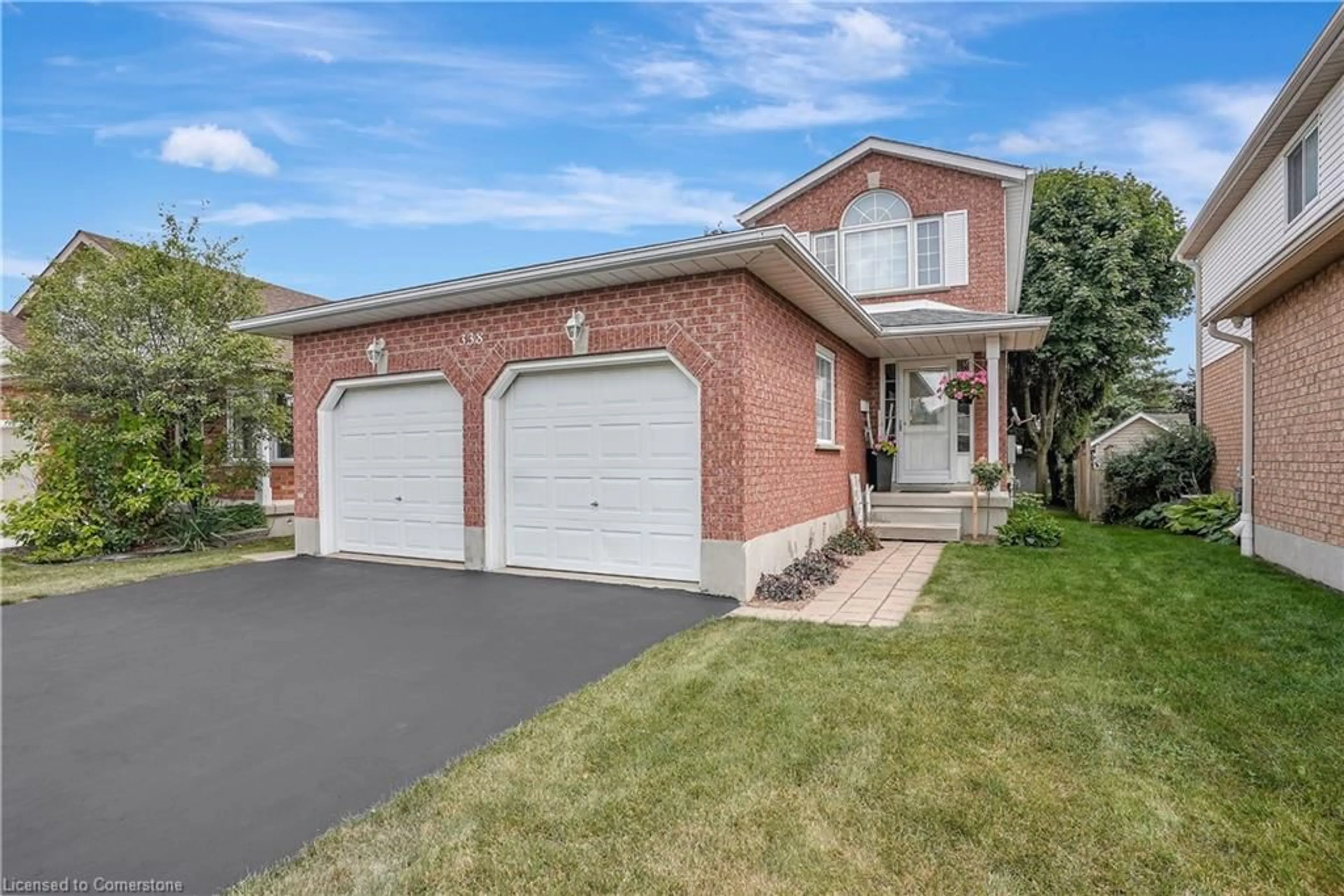 Home with brick exterior material, street for 338 Carriage House Crt, Waterloo Ontario N2K 3W8