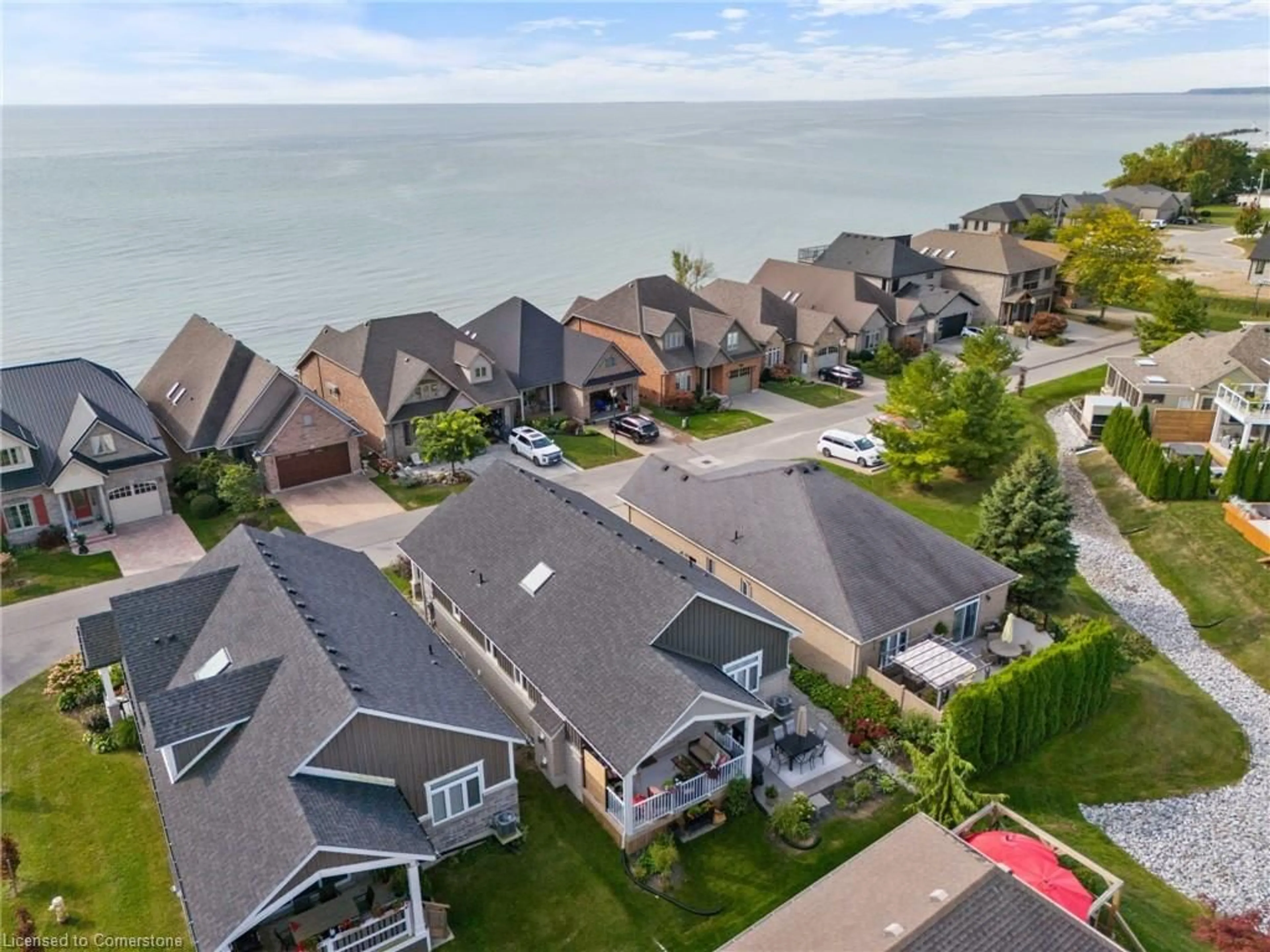 A pic from outside/outdoor area/front of a property/back of a property/a pic from drone, water/lake/river/ocean view for 80 New Lakeshore Rd #31, Port Dover Ontario N0A 1N8