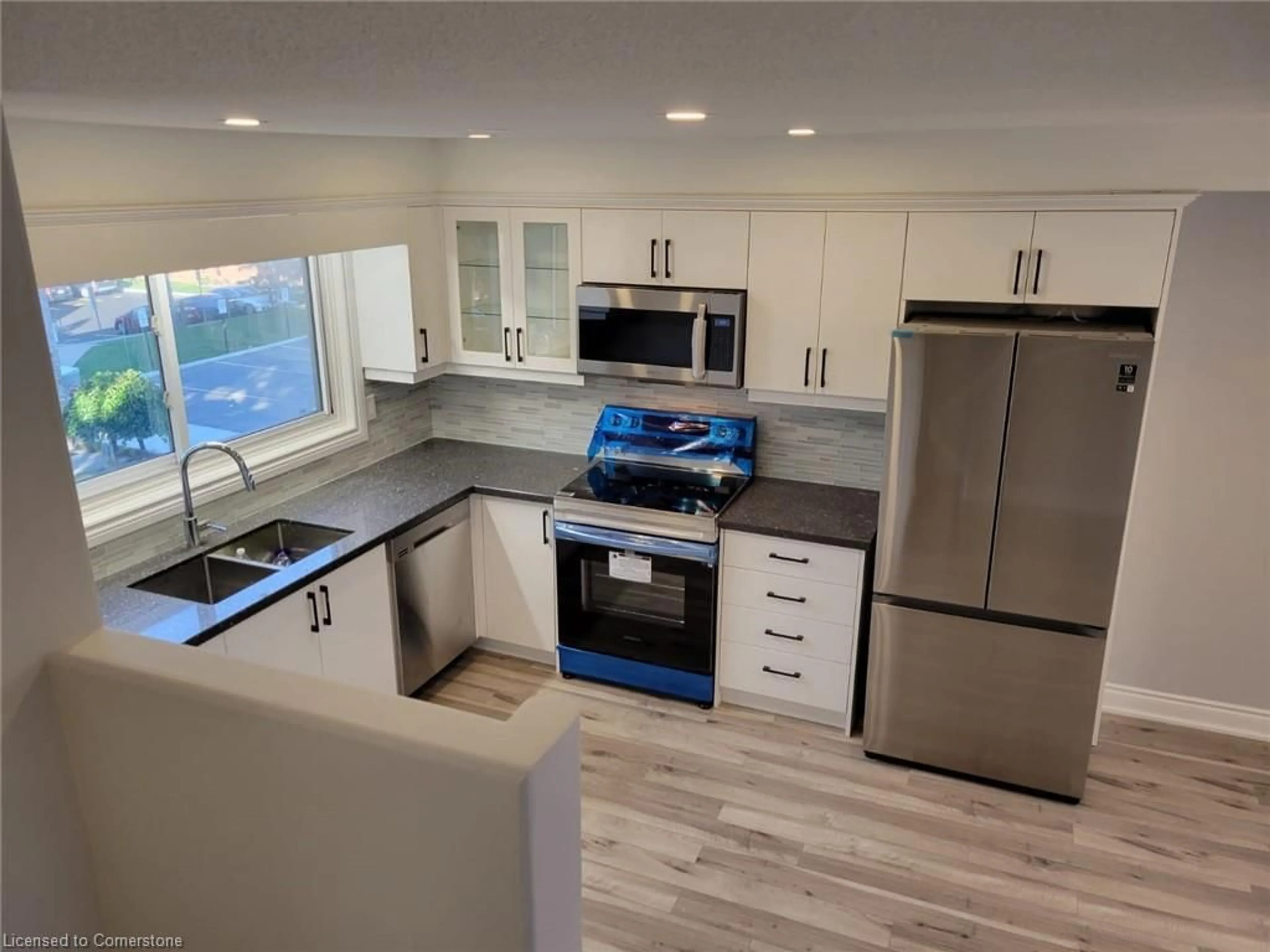 Open concept kitchen, unknown for 125 Bonaventure Dr #8, Hamilton Ontario L9C 5Y9