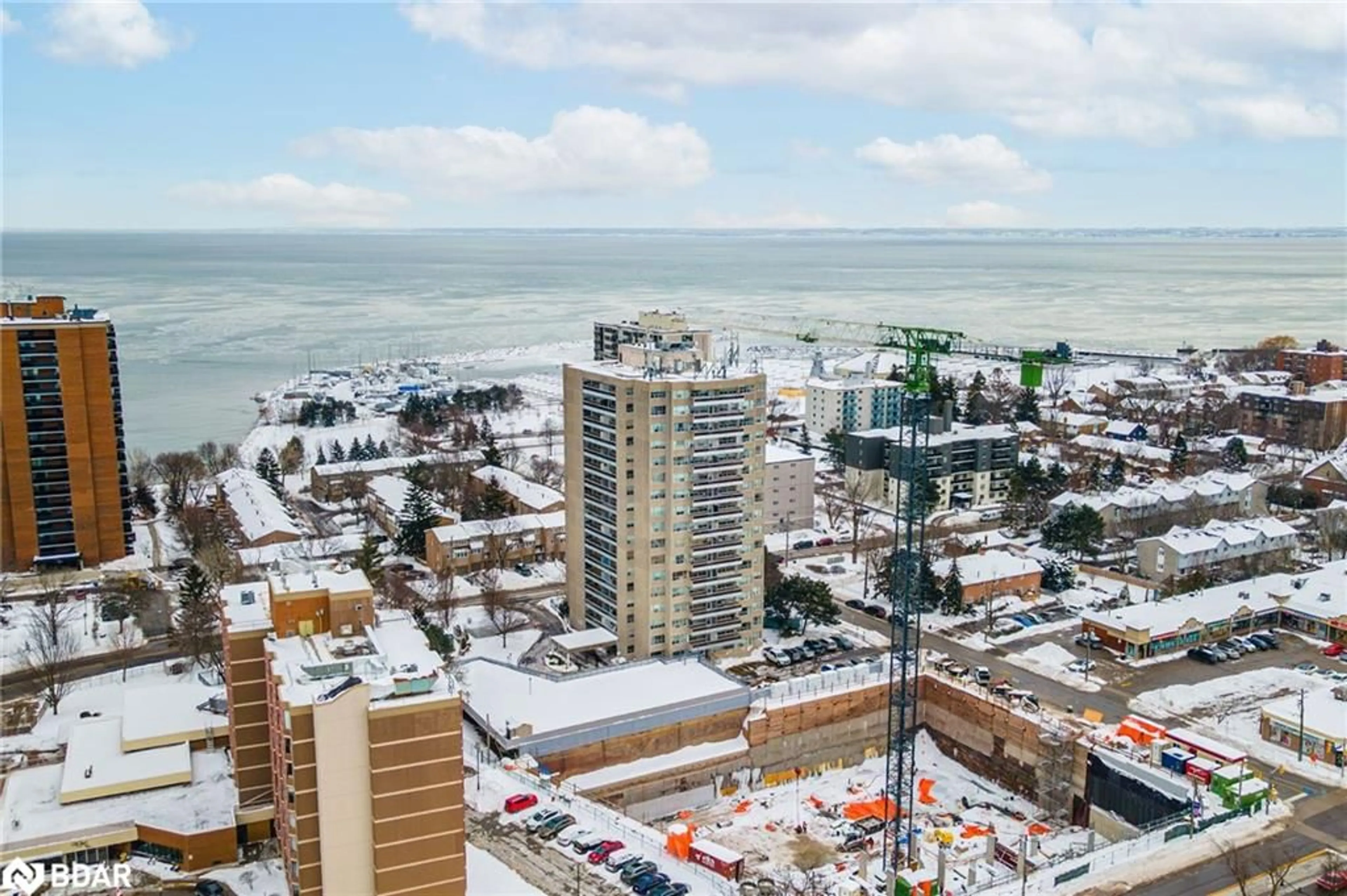 A pic from outside/outdoor area/front of a property/back of a property/a pic from drone, city buildings view from balcony for 2263 Marine Dr #705, Oakville Ontario L6L 5K1