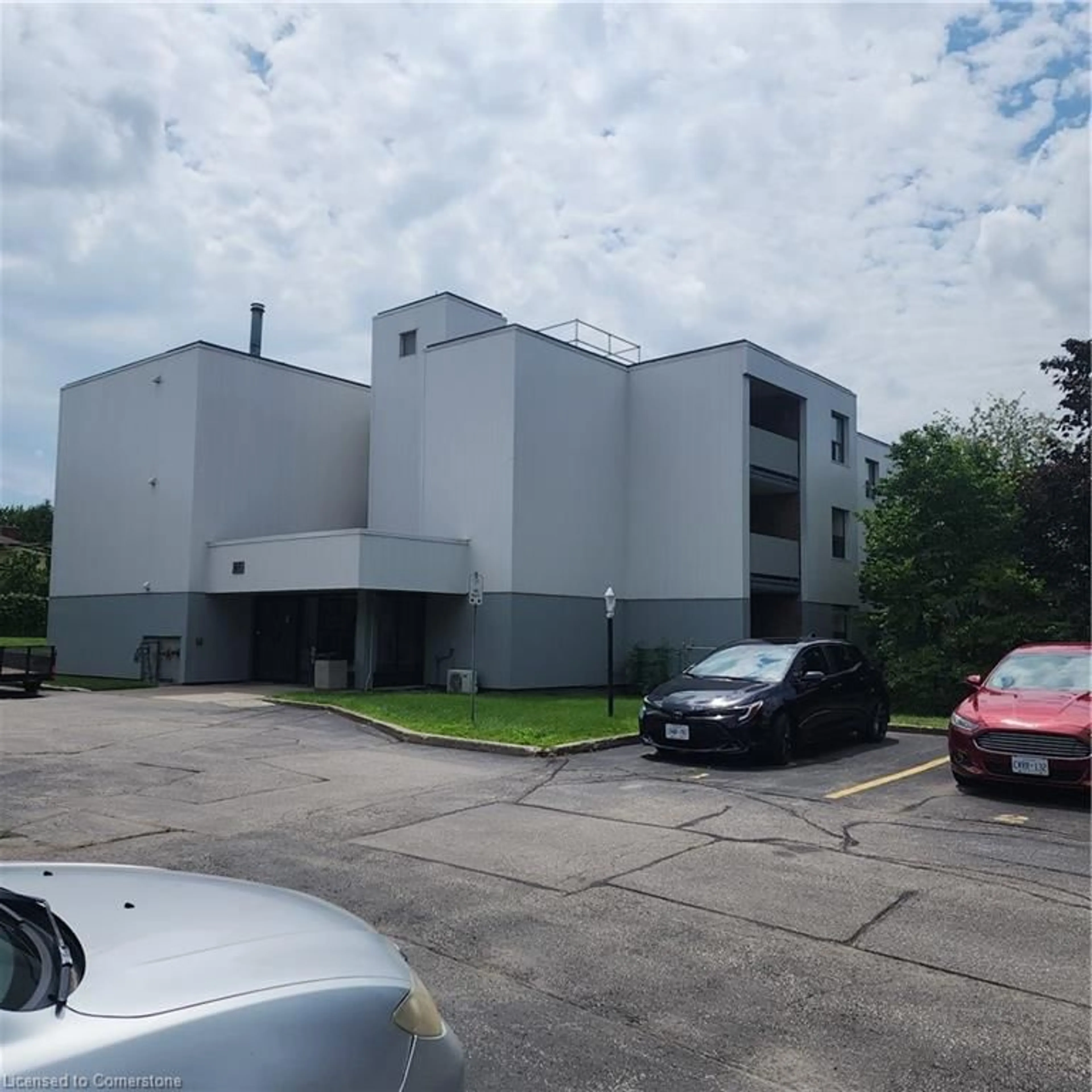 A pic from outside/outdoor area/front of a property/back of a property/a pic from drone, building for 65 Silvercreek Pky #307, Guelph Ontario N1H 7R9