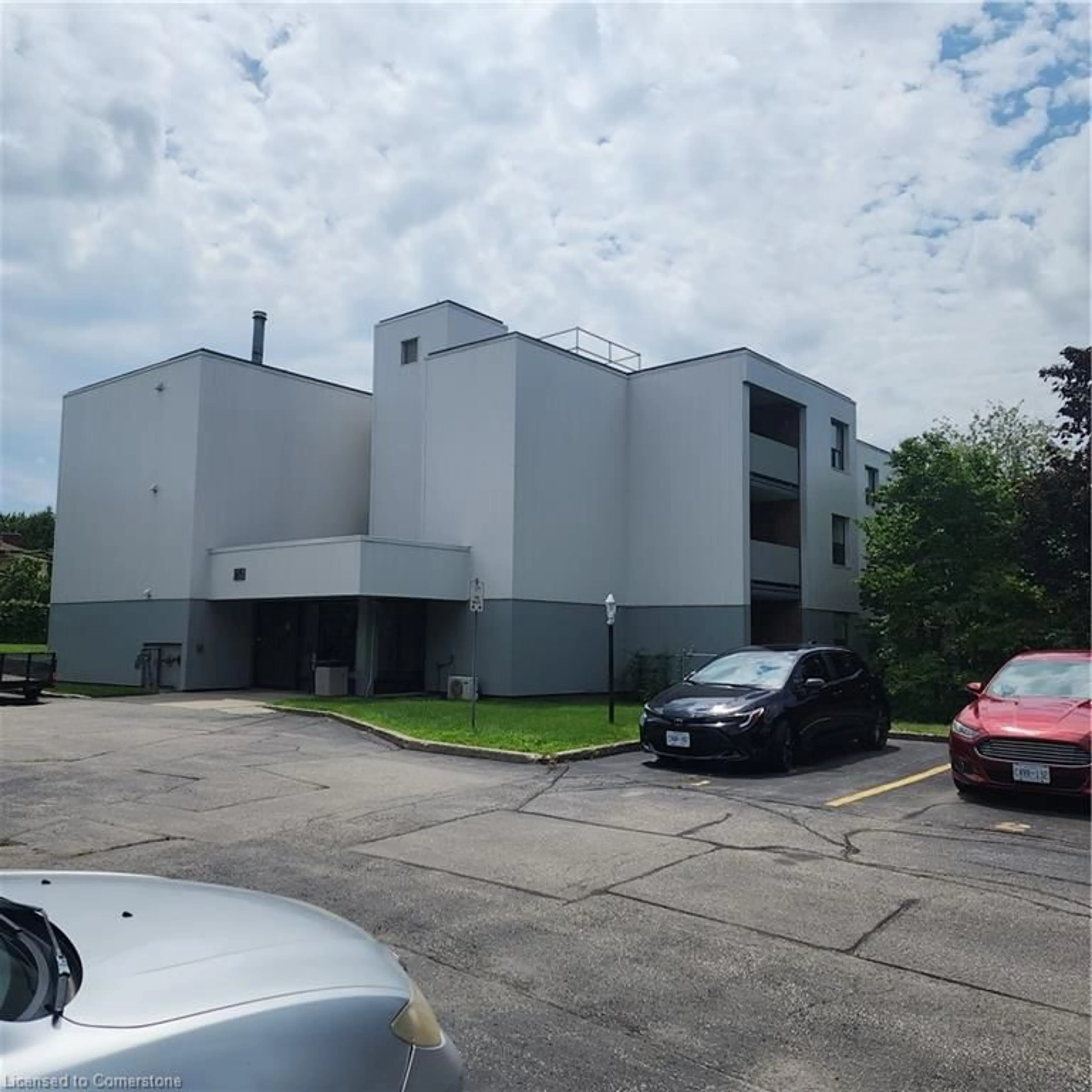 A pic from outside/outdoor area/front of a property/back of a property/a pic from drone, building for 65 Silvercreek Pky #307, Guelph Ontario N1H 7R9