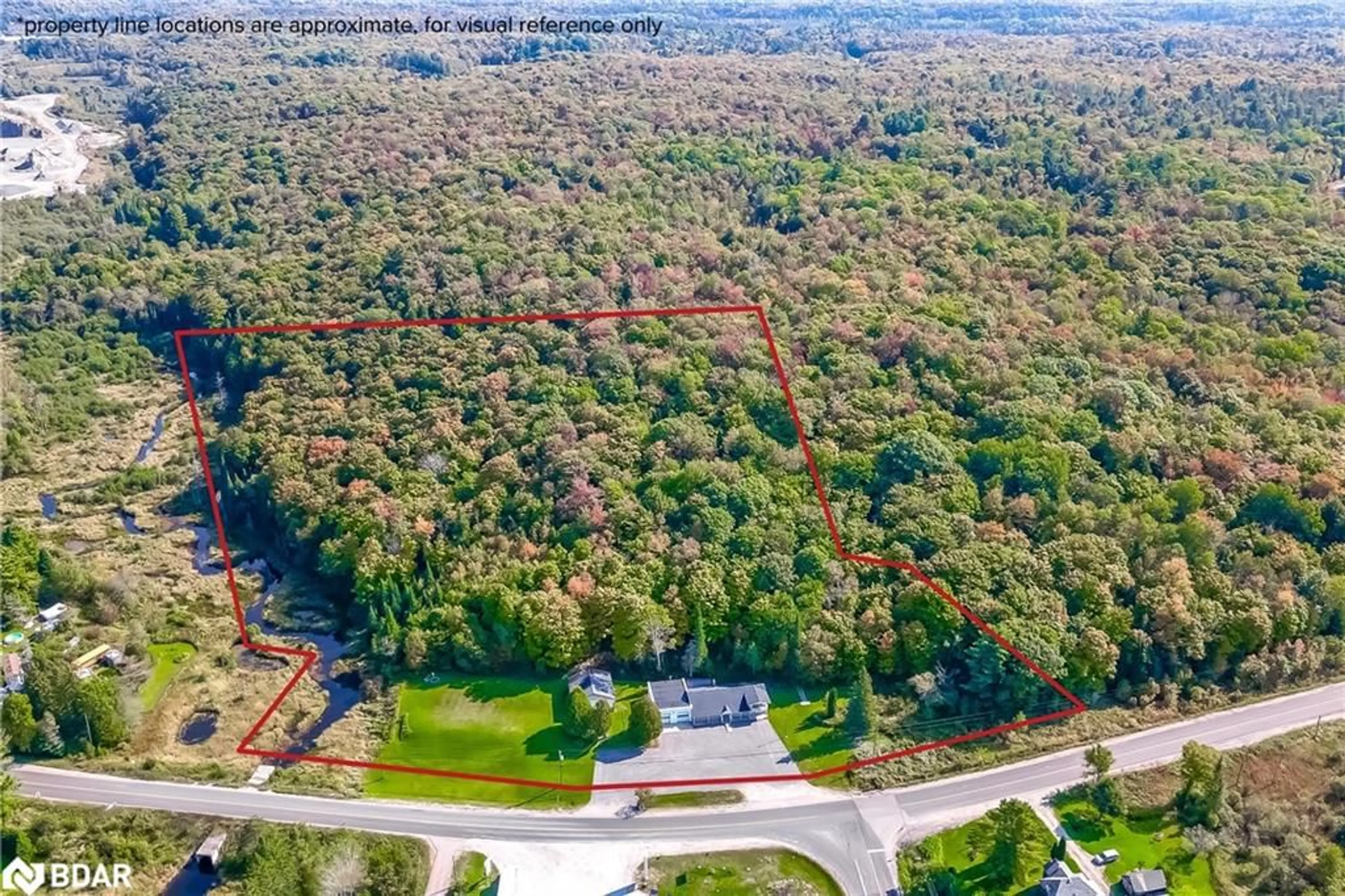 A pic from outside/outdoor area/front of a property/back of a property/a pic from drone, forest/trees view for 949 Raymond Rd, Utterson Ontario P0B 1M0