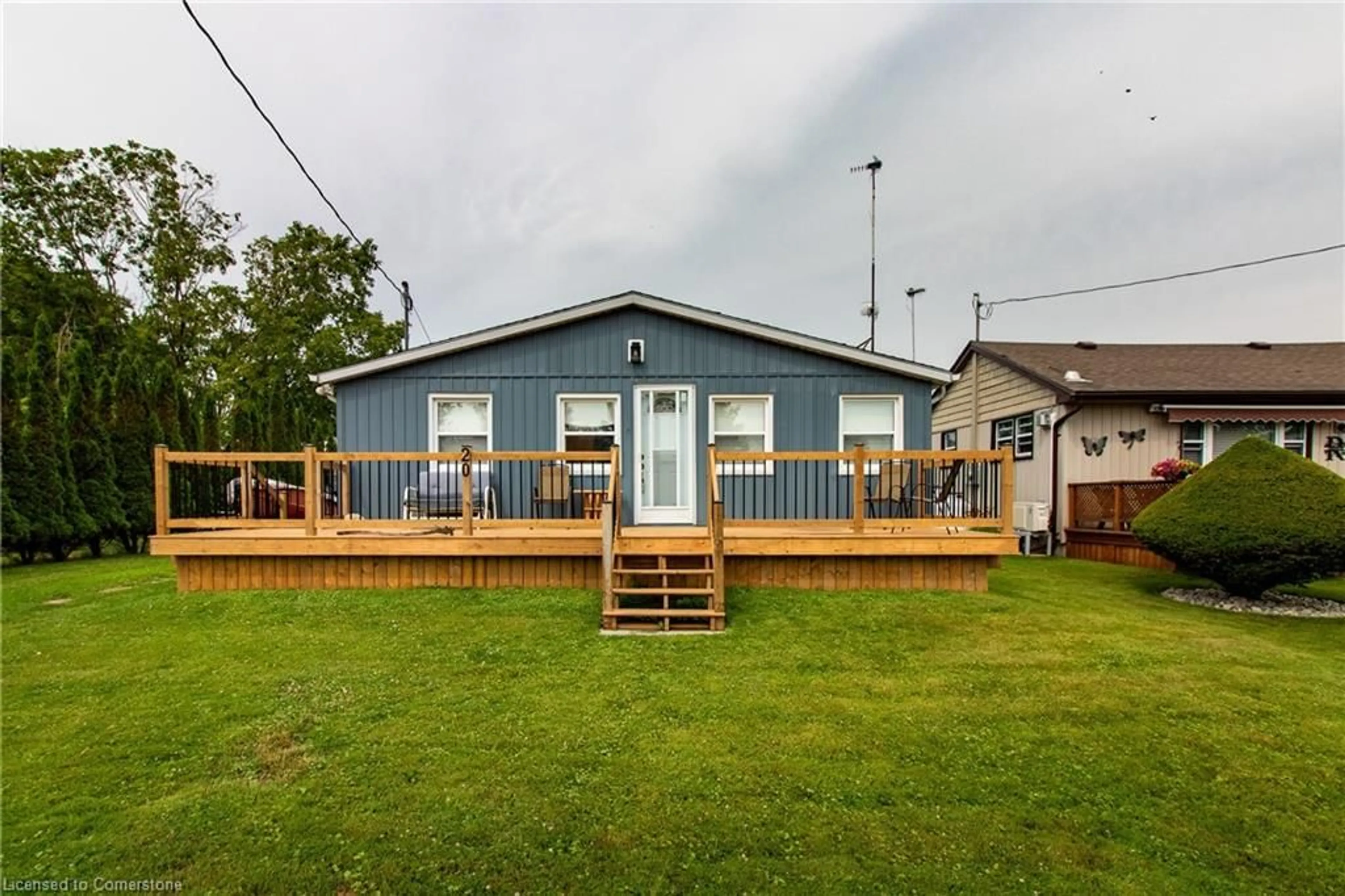 A pic from outside/outdoor area/front of a property/back of a property/a pic from drone, unknown for 20 4th Ave, Long Point Ontario N0E 1M0