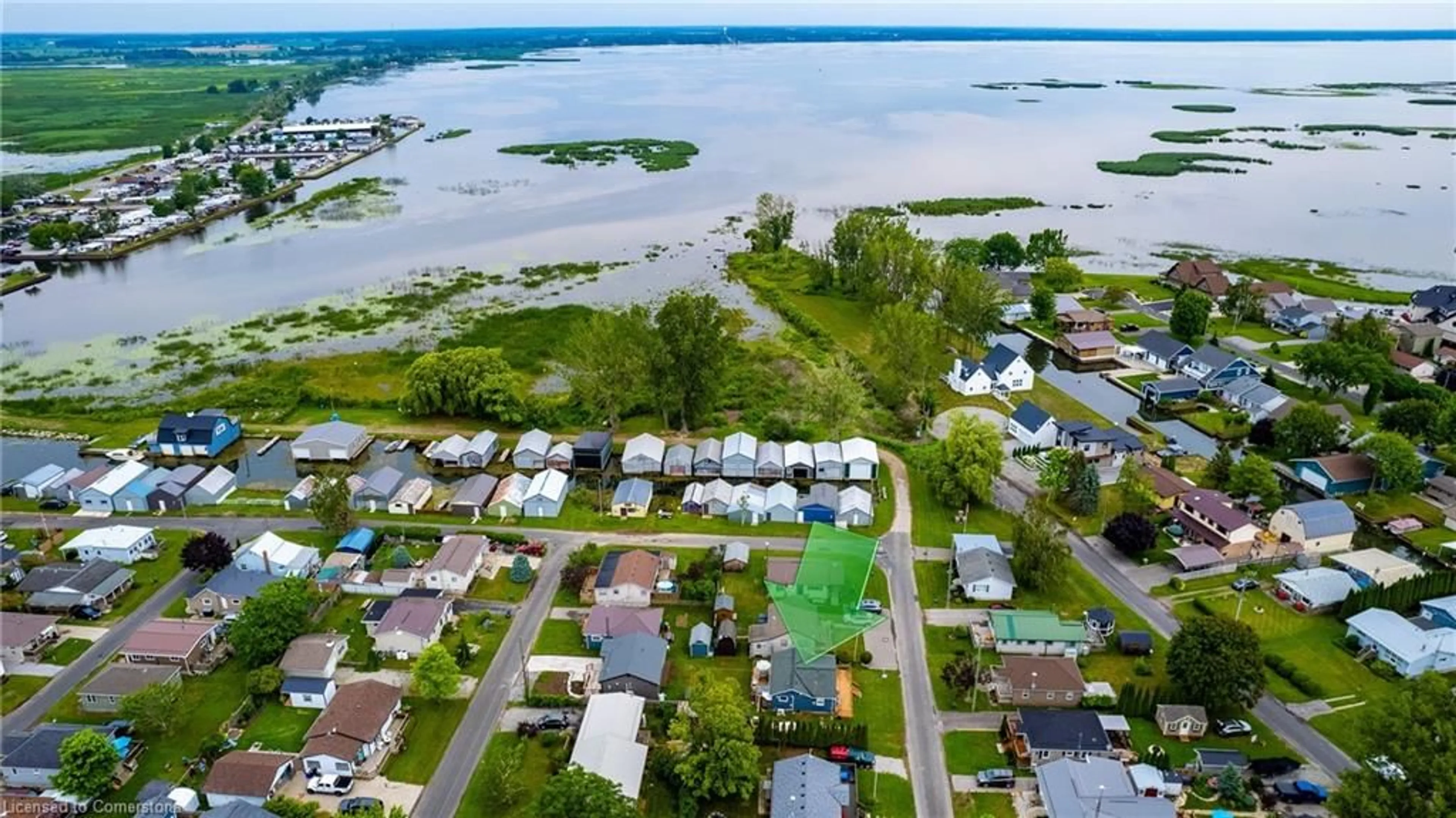 A pic from outside/outdoor area/front of a property/back of a property/a pic from drone, water/lake/river/ocean view for 20 4th Ave, Long Point Ontario N0E 1M0
