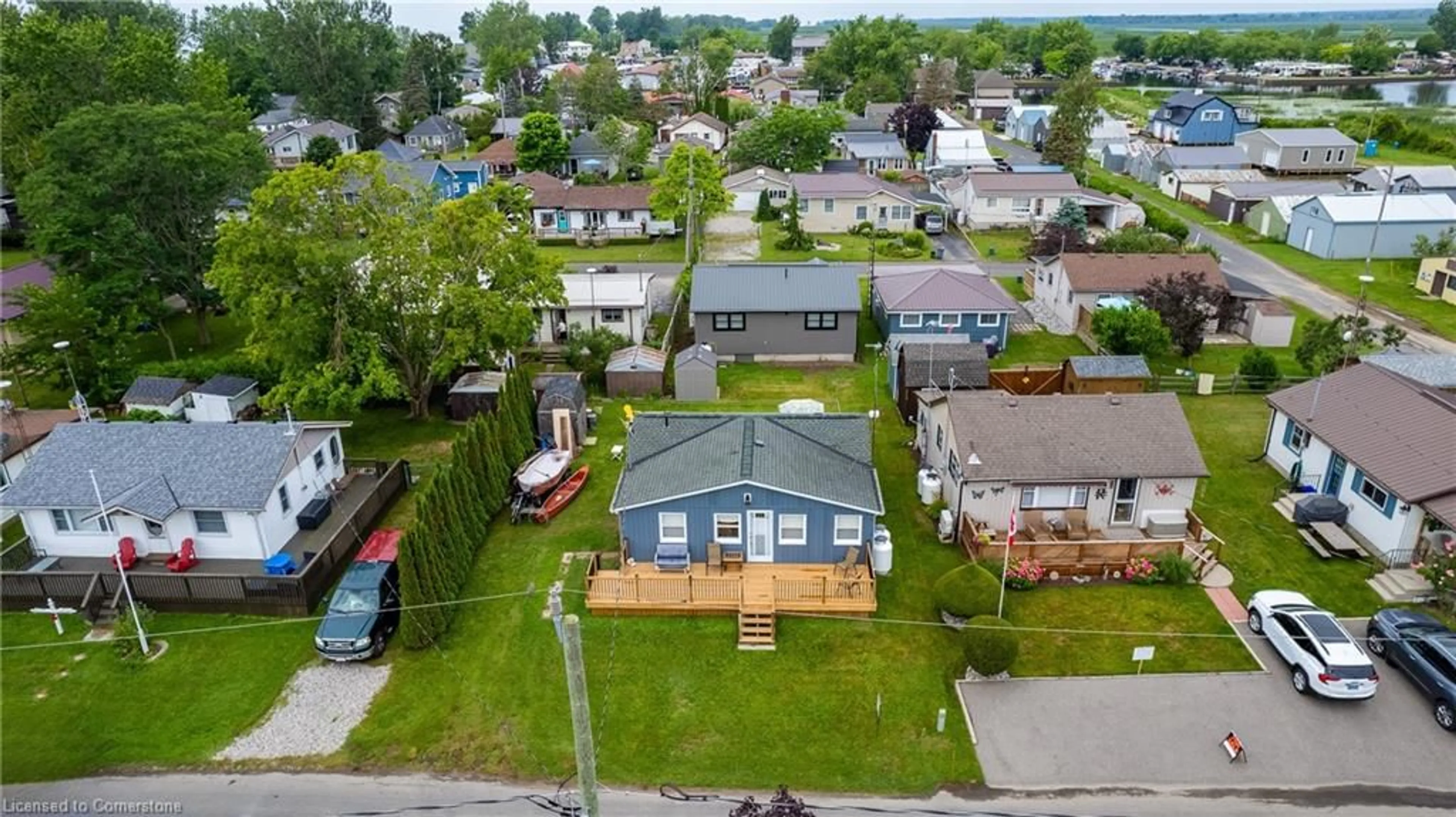 A pic from outside/outdoor area/front of a property/back of a property/a pic from drone, street for 20 4th Ave, Long Point Ontario N0E 1M0