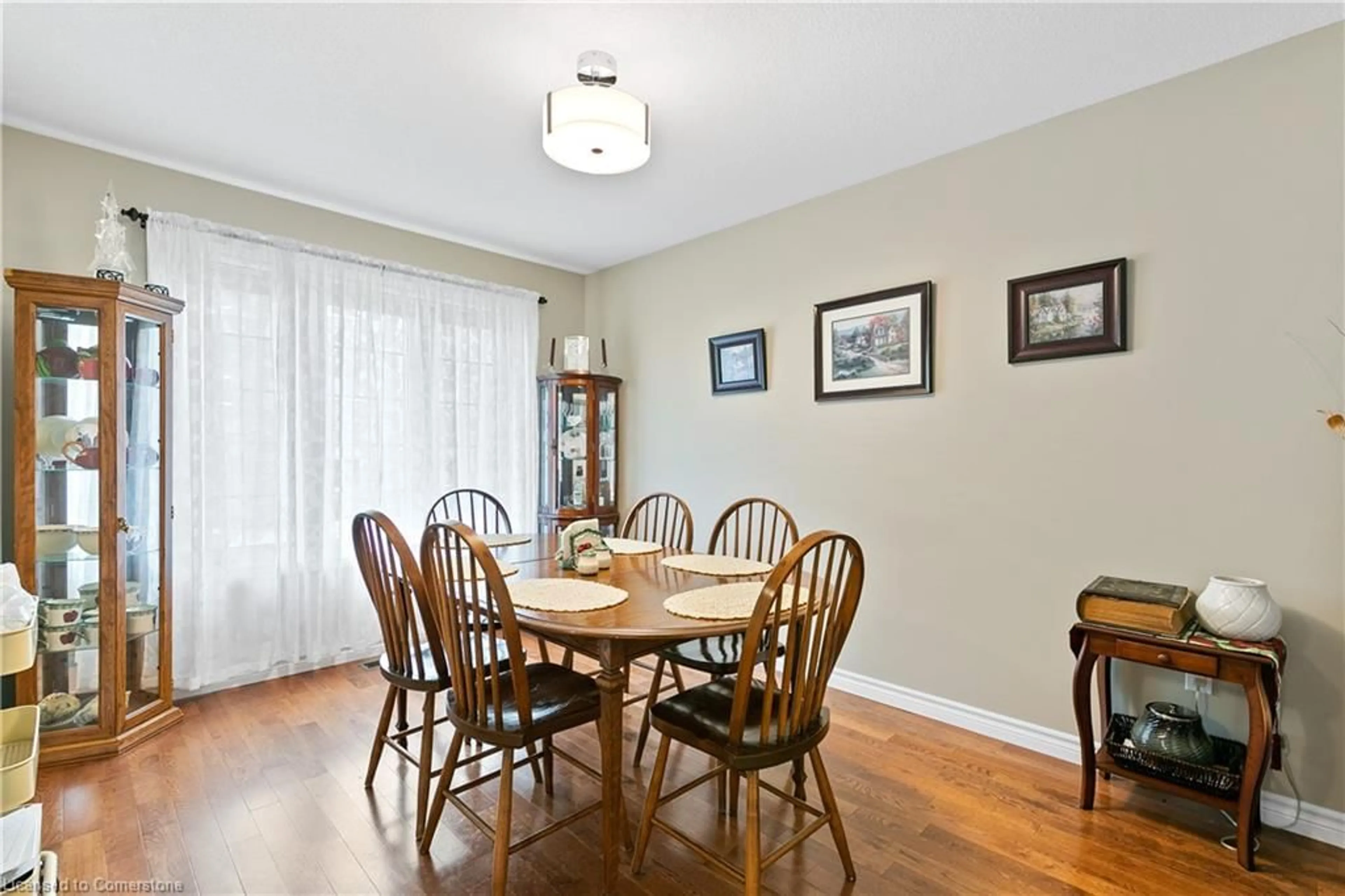 Dining room, wood/laminate floor for 401 Birmingham St #A7, Mount Forest Ontario N0G 2L2