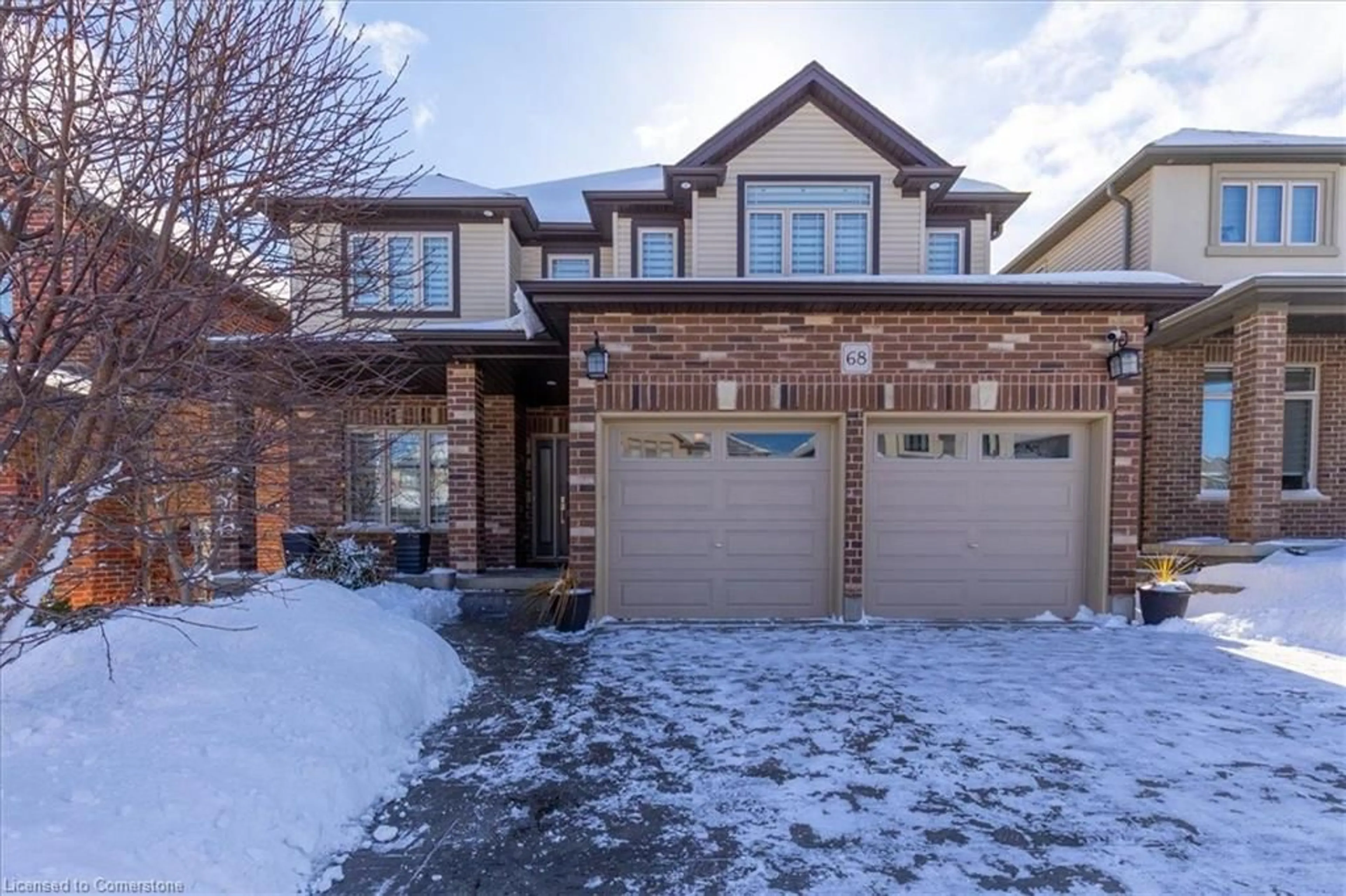 Home with brick exterior material, street for 68 Valleyscape Dr, Kitchener Ontario N2P 0G3