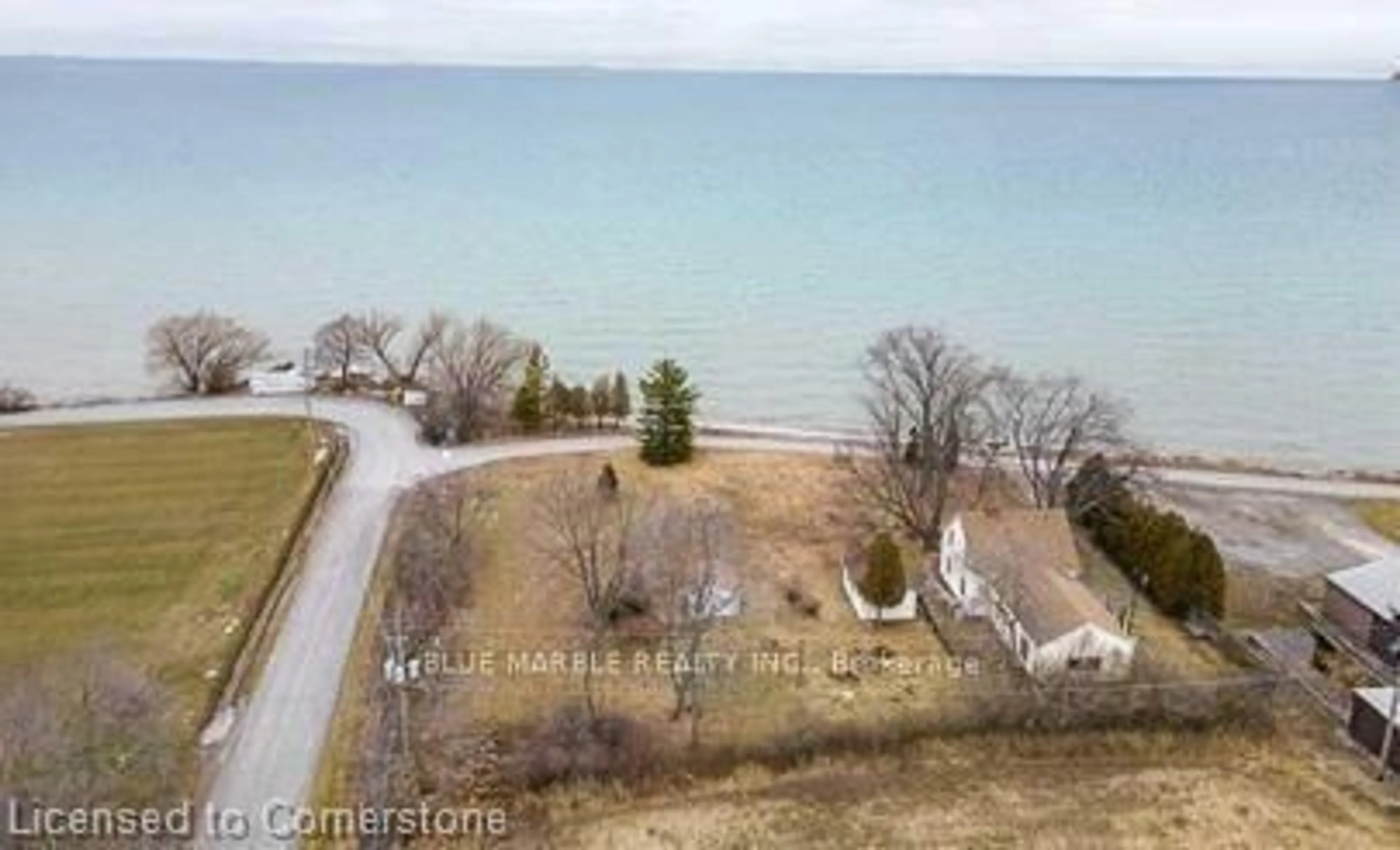 A pic from outside/outdoor area/front of a property/back of a property/a pic from drone, water/lake/river/ocean view for 3590 Lakeshore Rd, Peel Ontario L0R 1B1