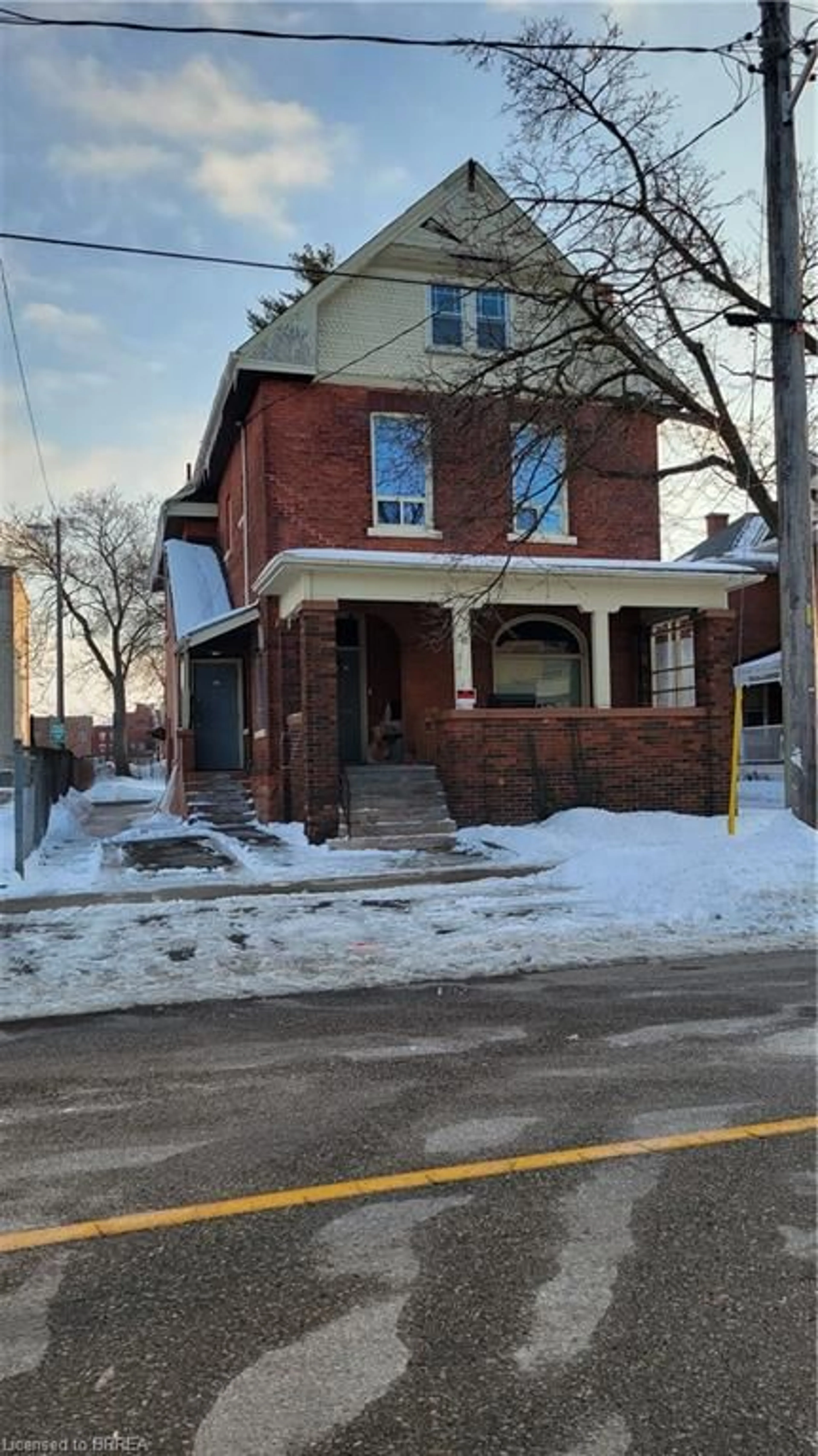 Home with brick exterior material, street for 33 Nelson St, Brantford Ontario N3T 2M7