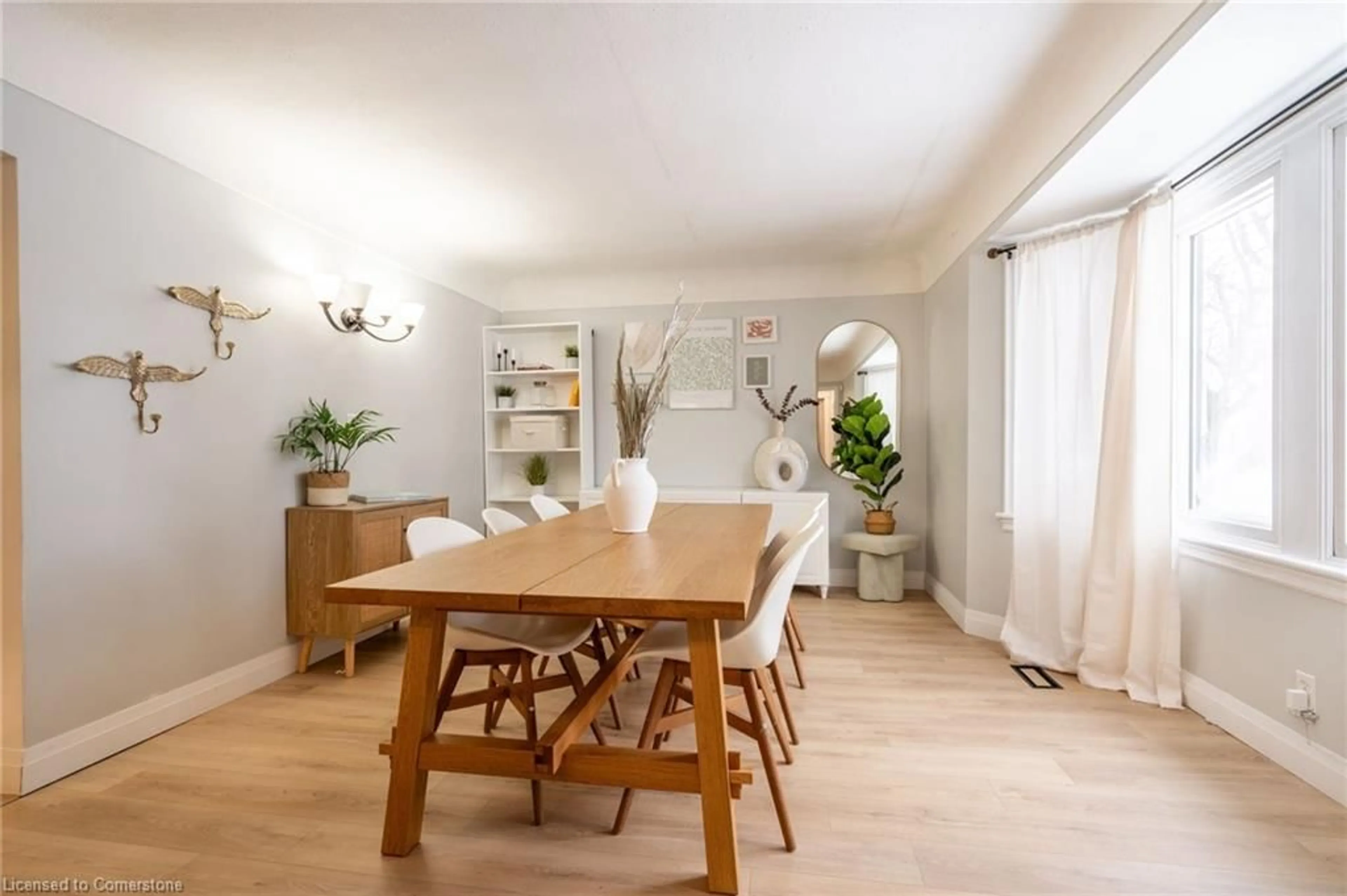 Dining room, wood/laminate floor for 351 Queensdale Ave, Hamilton Ontario L9A 1L5