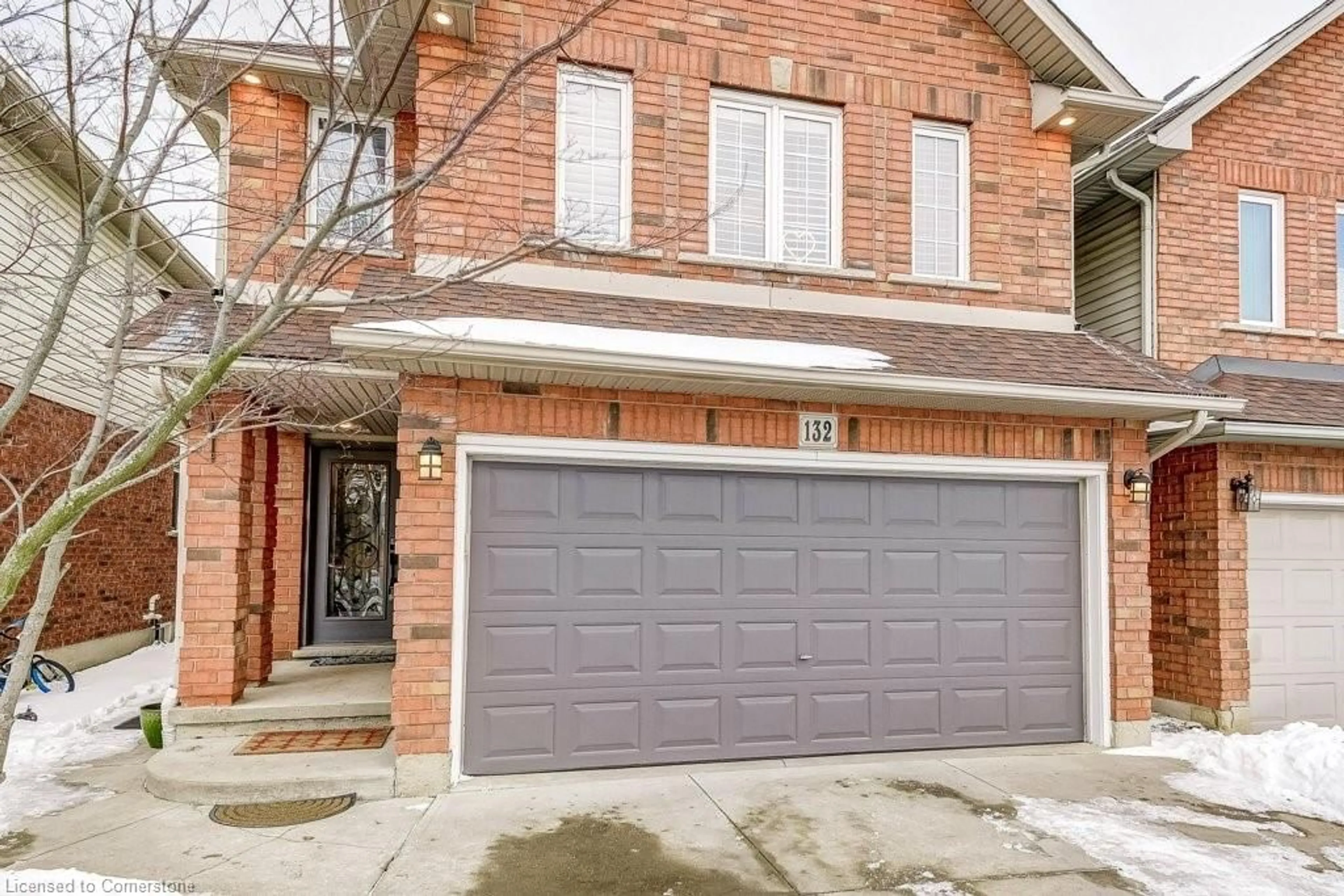 Home with brick exterior material, street for 132 Thoroughbred Blvd, Hamilton Ontario L9K 1N2