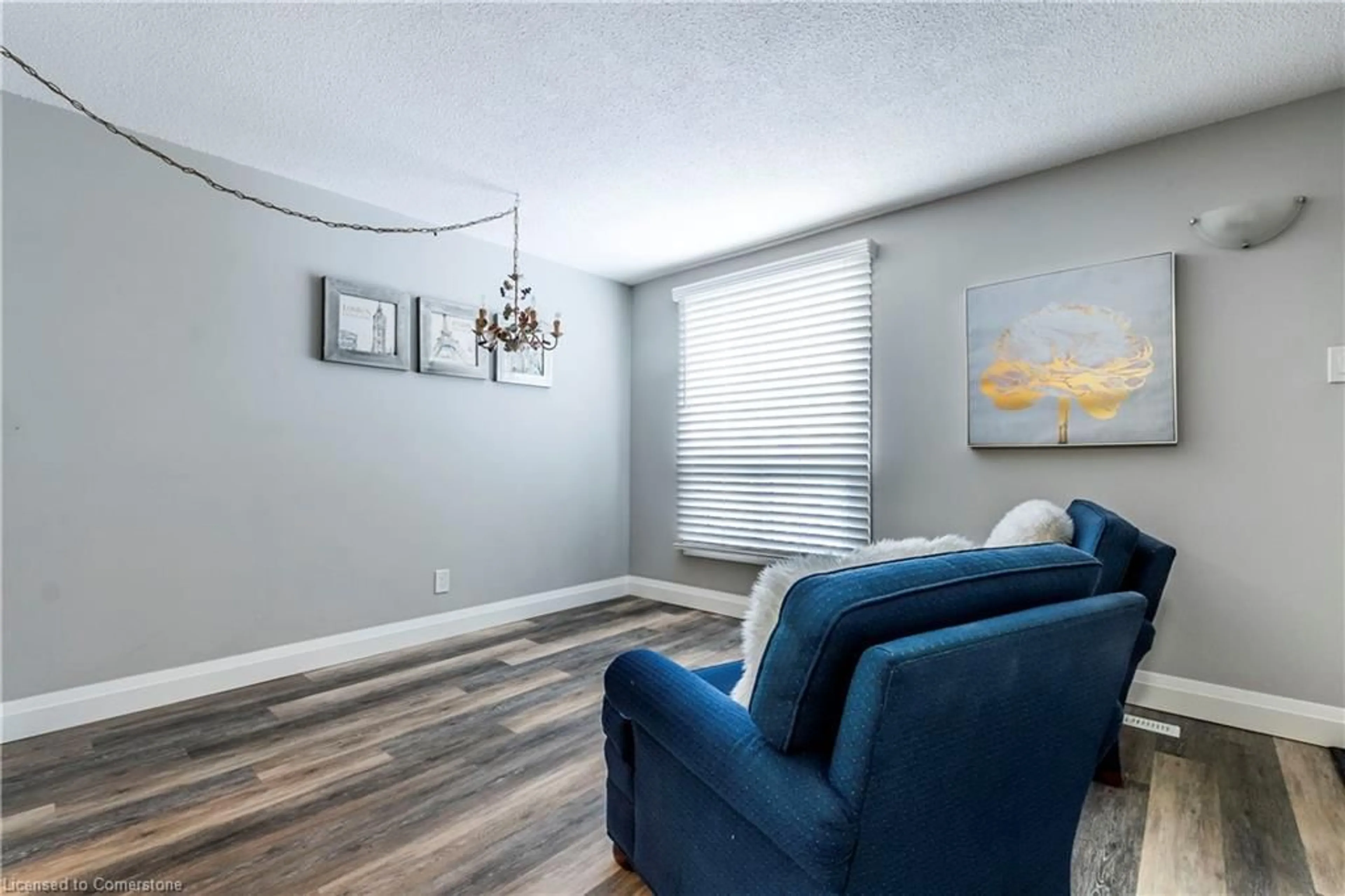 Living room with furniture, wood/laminate floor for 700 Paisley Rd #21, Guelph Ontario N1K 1A3