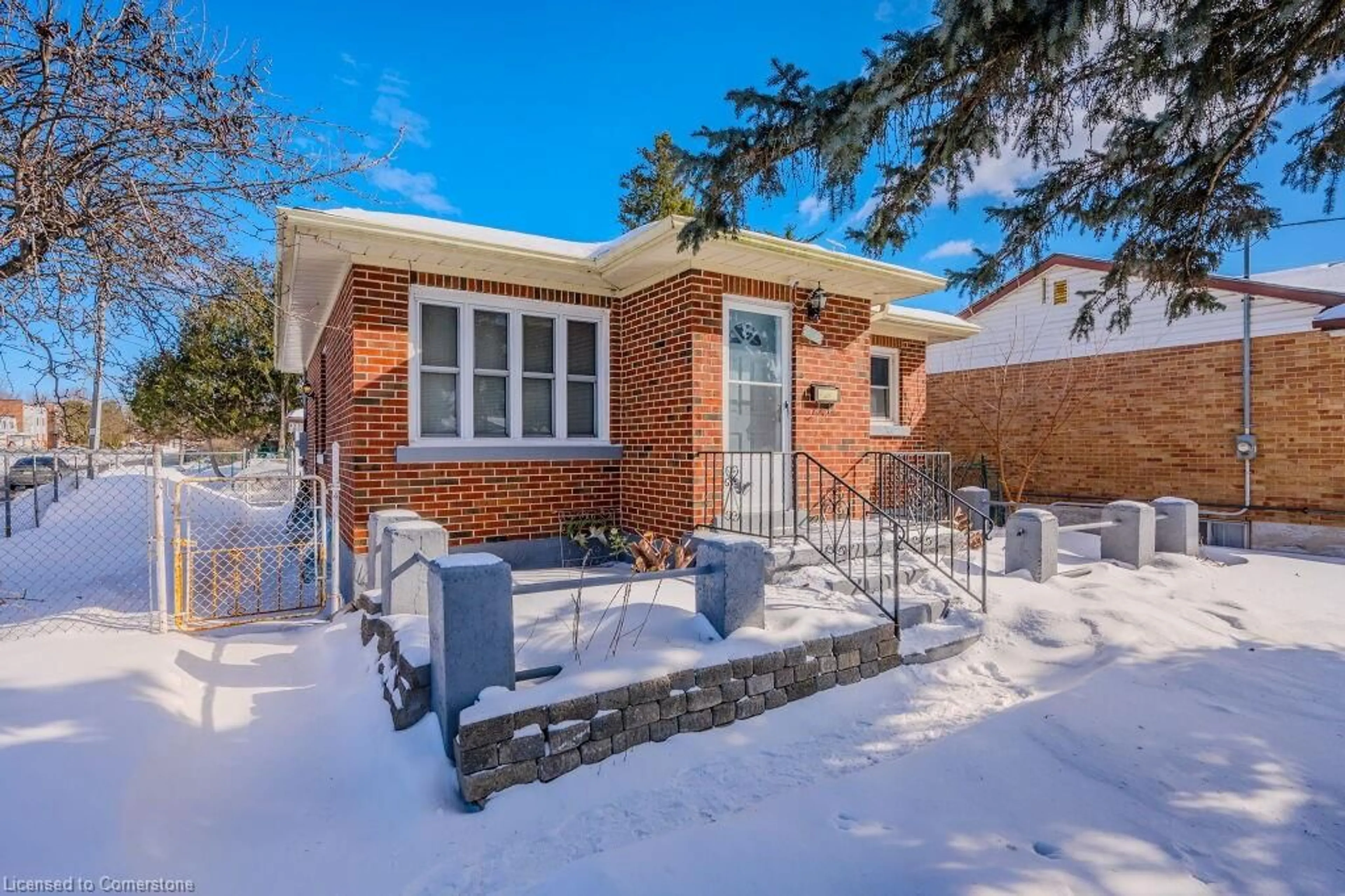 Home with brick exterior material, street for 390 Highland Rd, Kitchener Ontario N2M 3W7