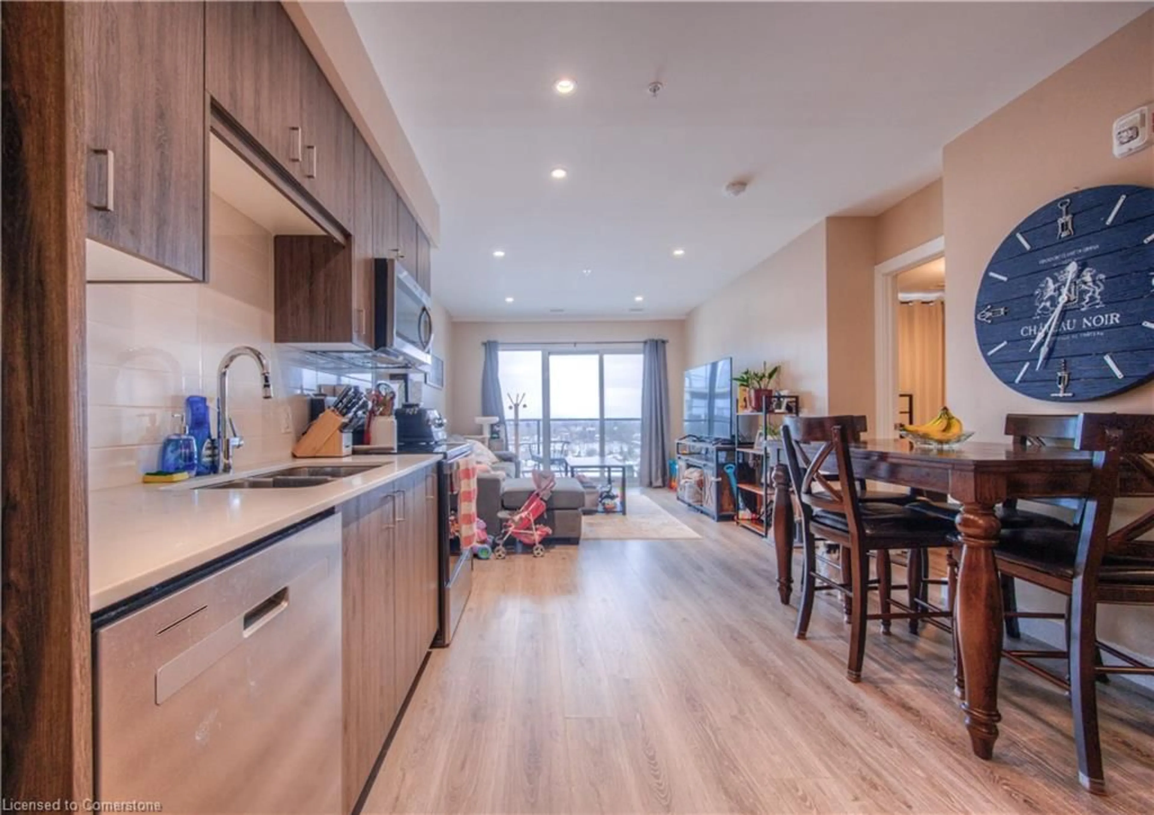 Open concept kitchen, wood/laminate floor for 15 Glebe St #1705, Cambridge Ontario N1S 0C3